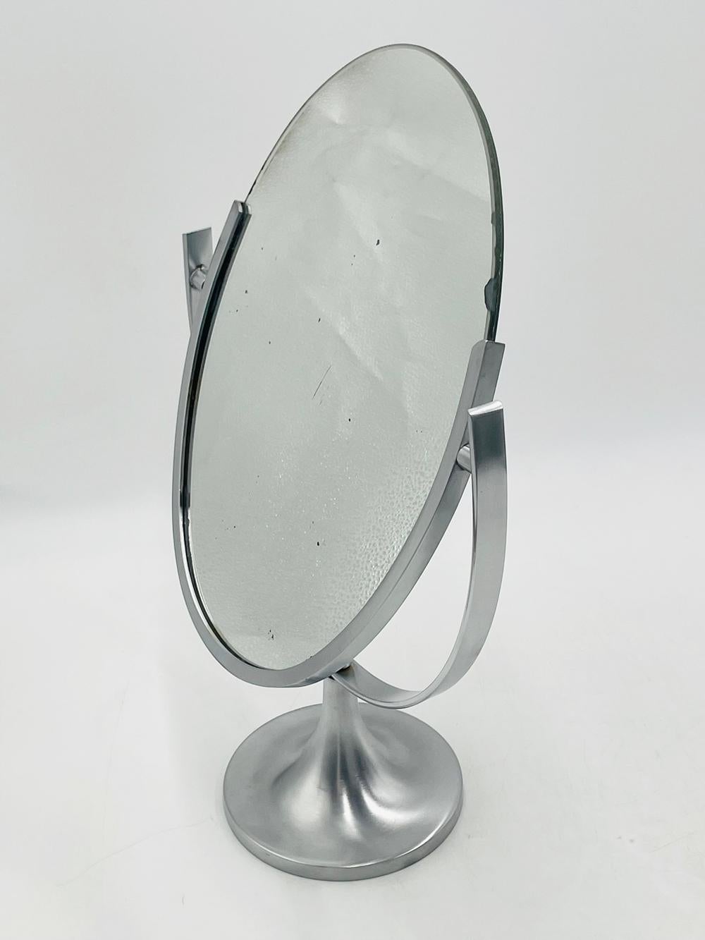 Introducing the Bugle Base Vanity Mirror by Charles Hollis Jones, a true vintage gem from the 1960s that exudes timeless elegance. This striking piece of furniture showcases exceptional craftsmanship and showcases the iconic design aesthetic of