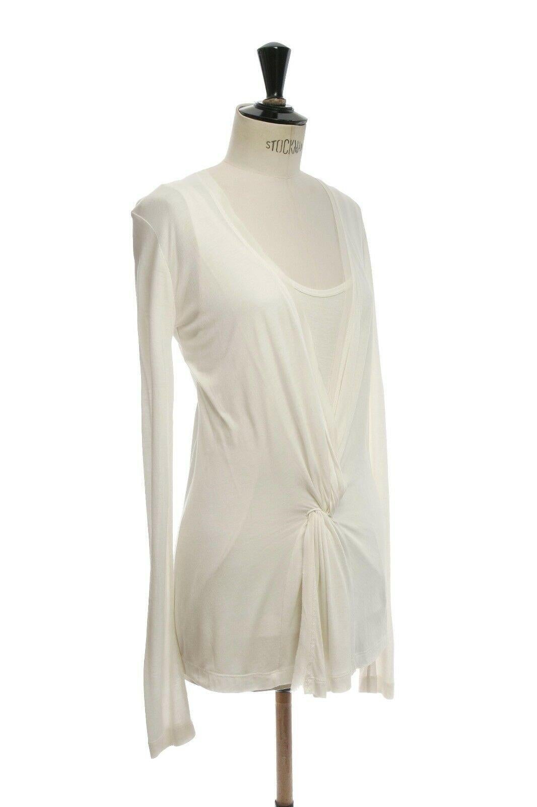 BUI BARBARA BUI white draped knotted front viscose silk long sleeve top XS US0 
Reference: LNKO/A00023 
Brand: Barbara Bui 
Designer: Barbara Bui 
Material: Viscose 
Color: White 
Pattern: Solid 
Extra Detail: Viscose, silk. Scoop neck. Faux overlay
