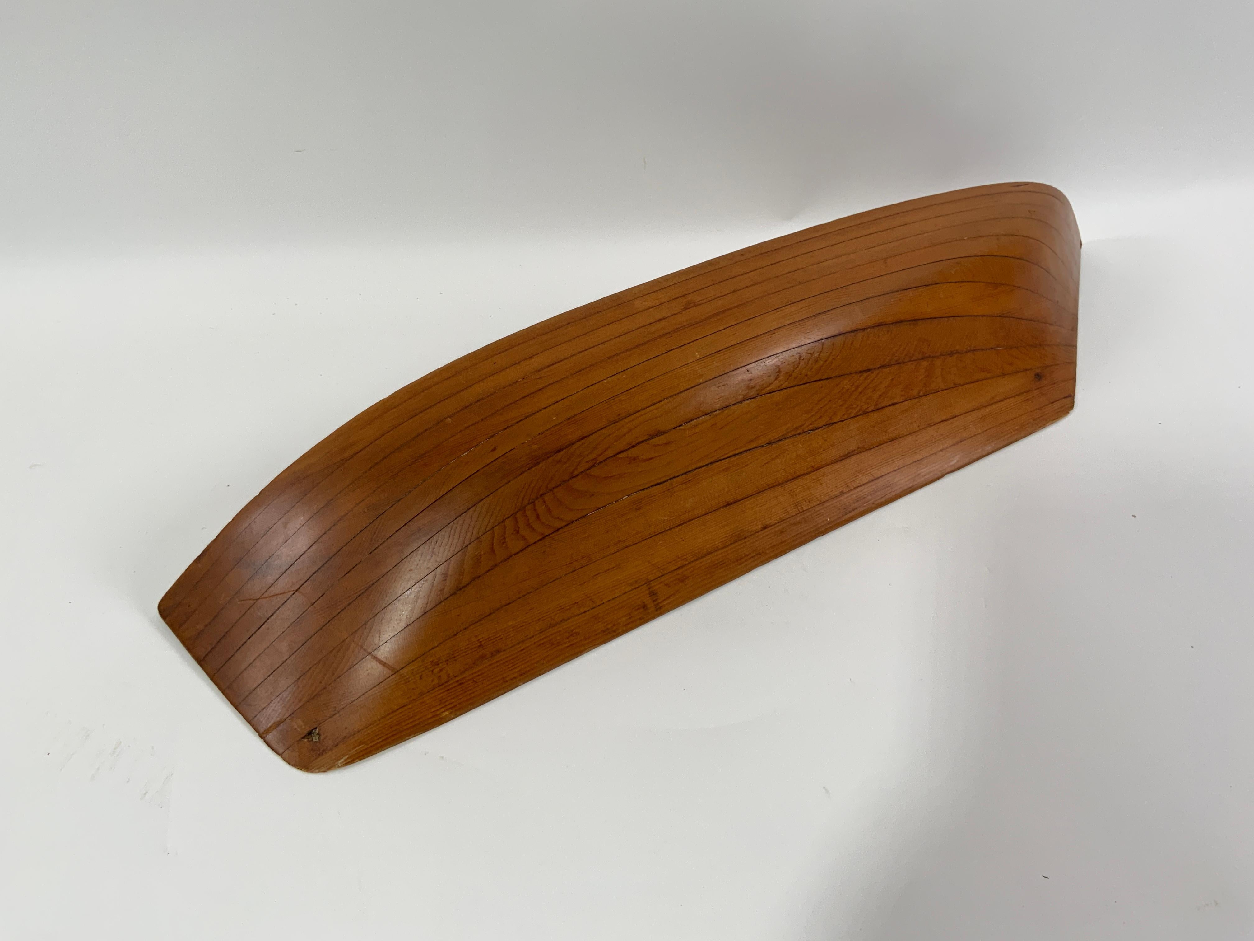 Eastport Pinky Maine Fishing & Craft. Original laminated half model of a double ended fishing schooner. Carefully carved from a laminated block of eleven lifts. Stunning shape. Circa 1840.