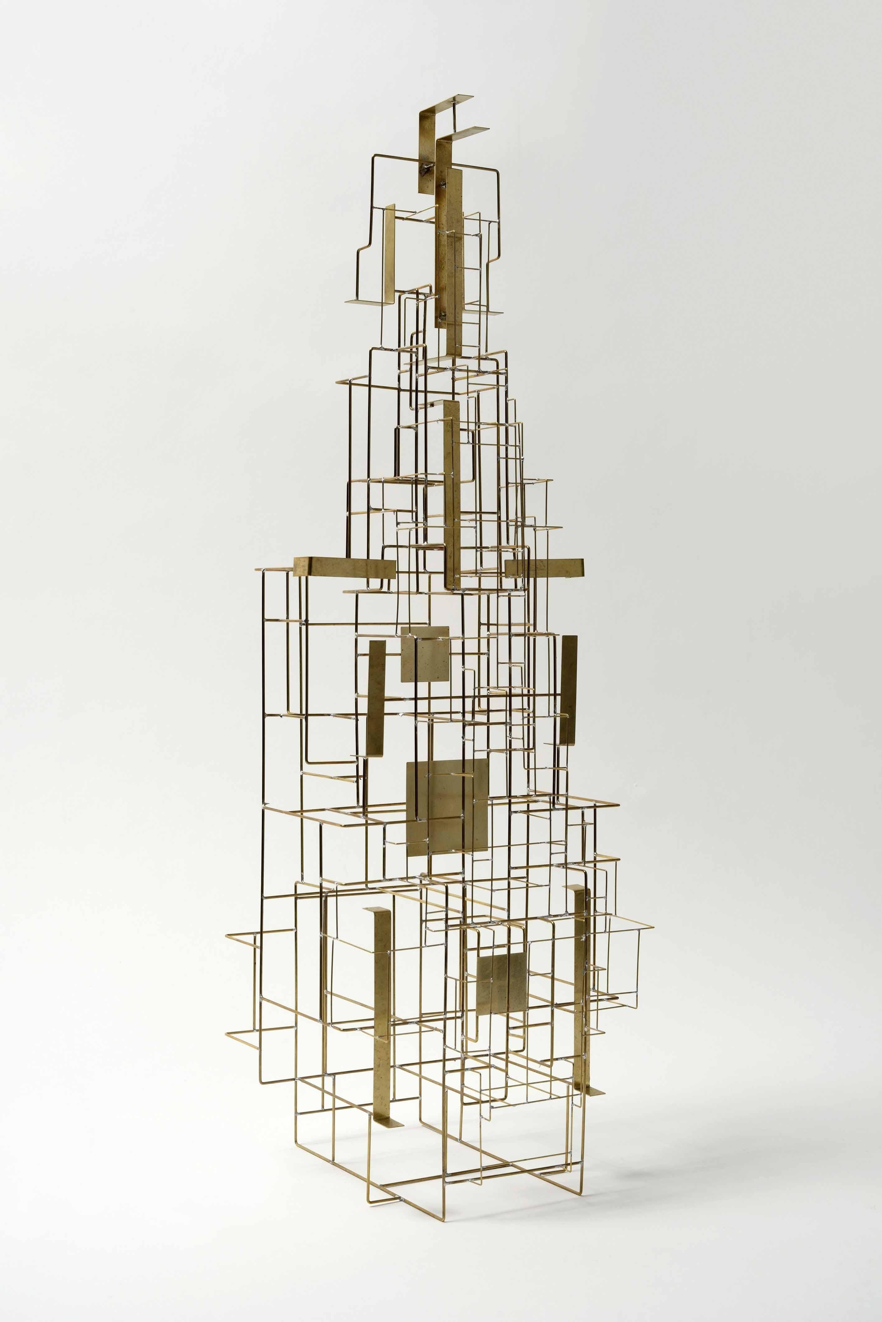 Building was created in 2018 by French designer Eric de Dormael. Handcrafted in brass, this is a unique piece.
Éric de Dormael is an unconventional artist, his trajectory far from the beaten track. Trained at the Saint-Luc school in Tournai and at