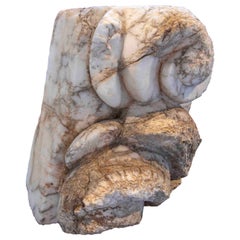 Building Coping Carved in Marble with Rounded Volute Shapes