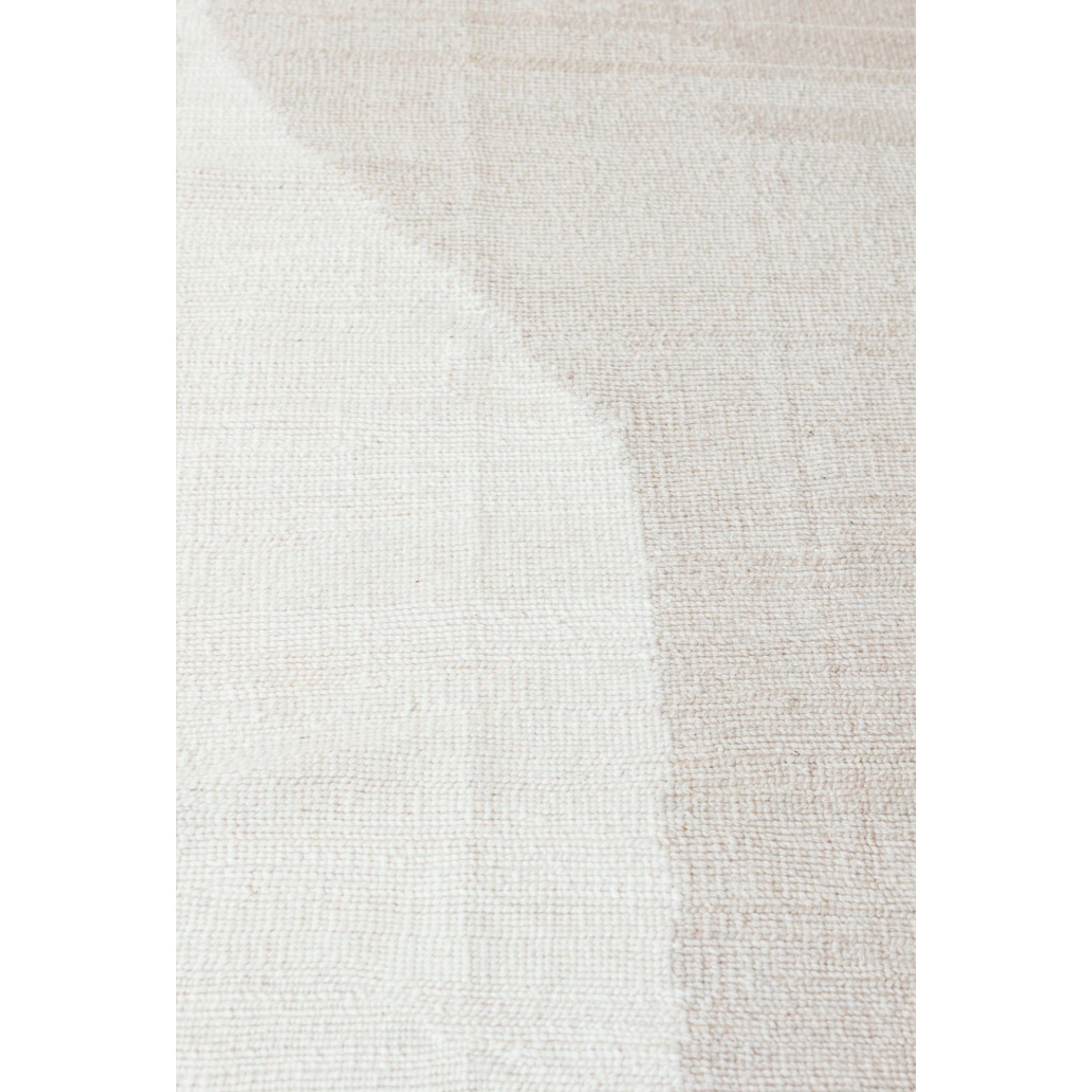 Buja is the first rug in our flat collection.

The design is soft and the muted color variation is soothing.

The flat collection meets the need to provide an anchoring piece in a room while allowing other elements of decor to shine.

This rug