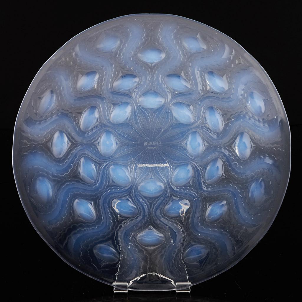 'Bulbes No.2', an Art Deco opalescent and frosted glass plate by René Lalique with bulb details. Signed R Lalique France to centre.

René Jules Lalique (French, 1860–1945) was a renowned jeweller and master glassmaker. As one of the leading figures