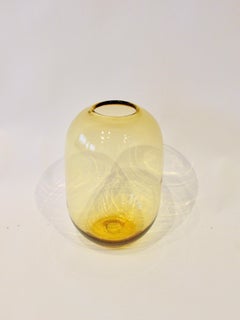 Bulbous amber tone bottle or jar vase attributed to Blenko glass