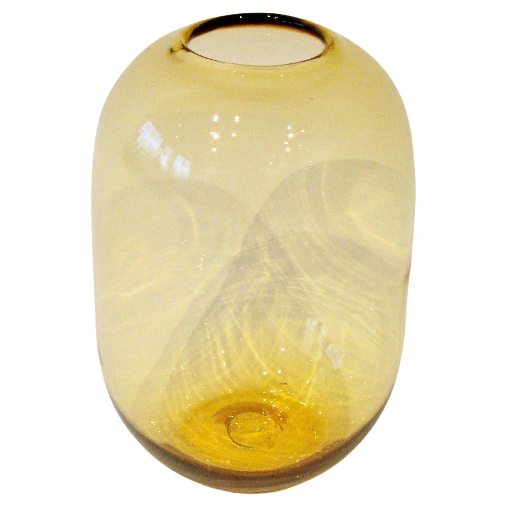 Bulbous amber tone bottle or jar vase attributed to Blenko glass