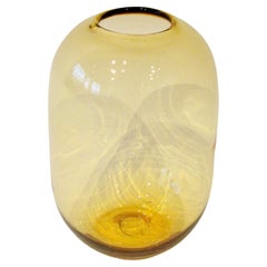 Bulbous amber tone bottle or jar vase attributed to Blenko glass
