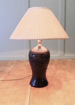 Bulbous Ceramic Black Table Lamp The lamp is a beautifully shaped ceramic piece