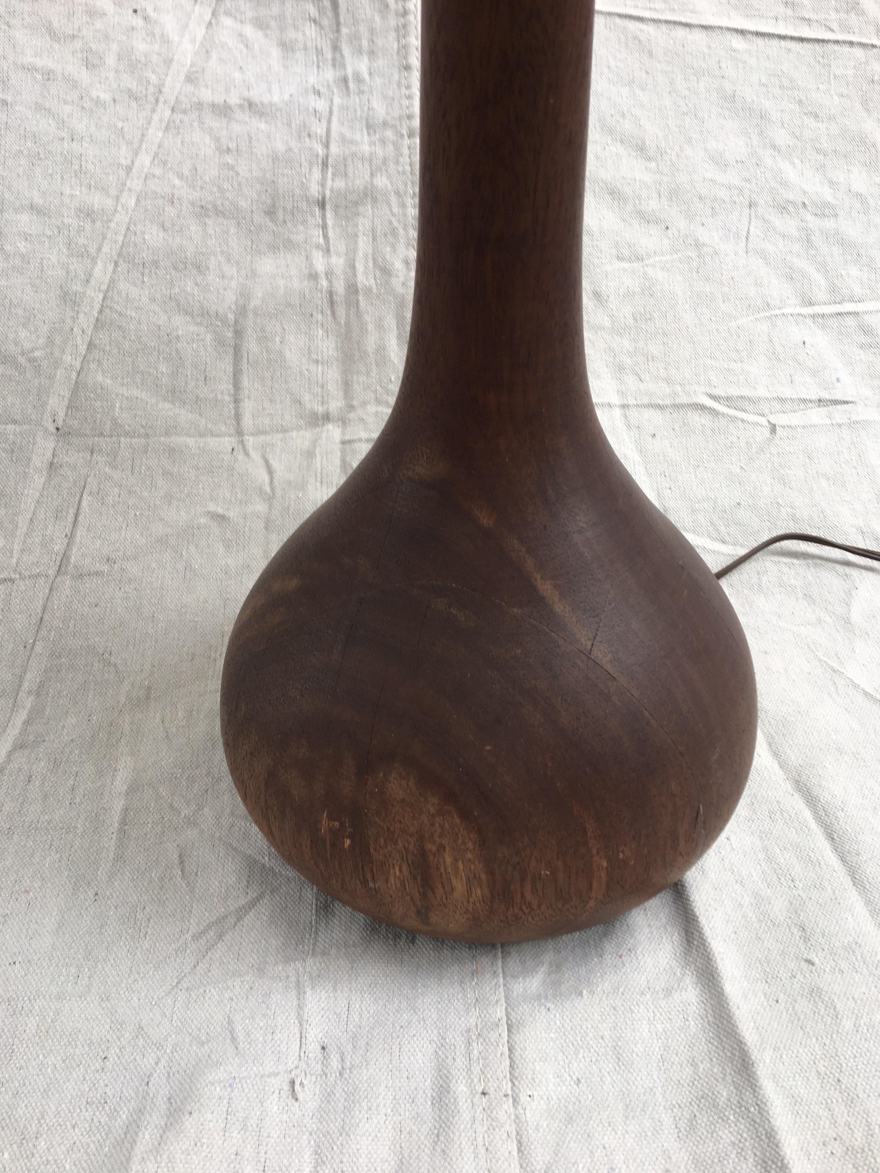 Bulbous teak table lamp, exaggerated heavy base. Wood measures 15.5 tall and 7.5 round.