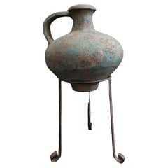 Bulbous Terracotta Vase on Metal Stand