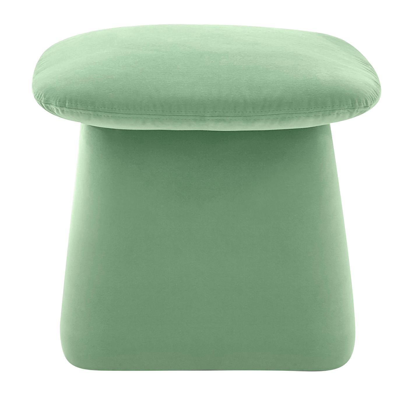 A stunning, simple shape recalling a stylized mushroom, this gorgeous pouf will make a vivacious and original addition to both an eclectic and minimalist interior. The structure is fashioned of wood and is padded with polyurethane foam, elegantly