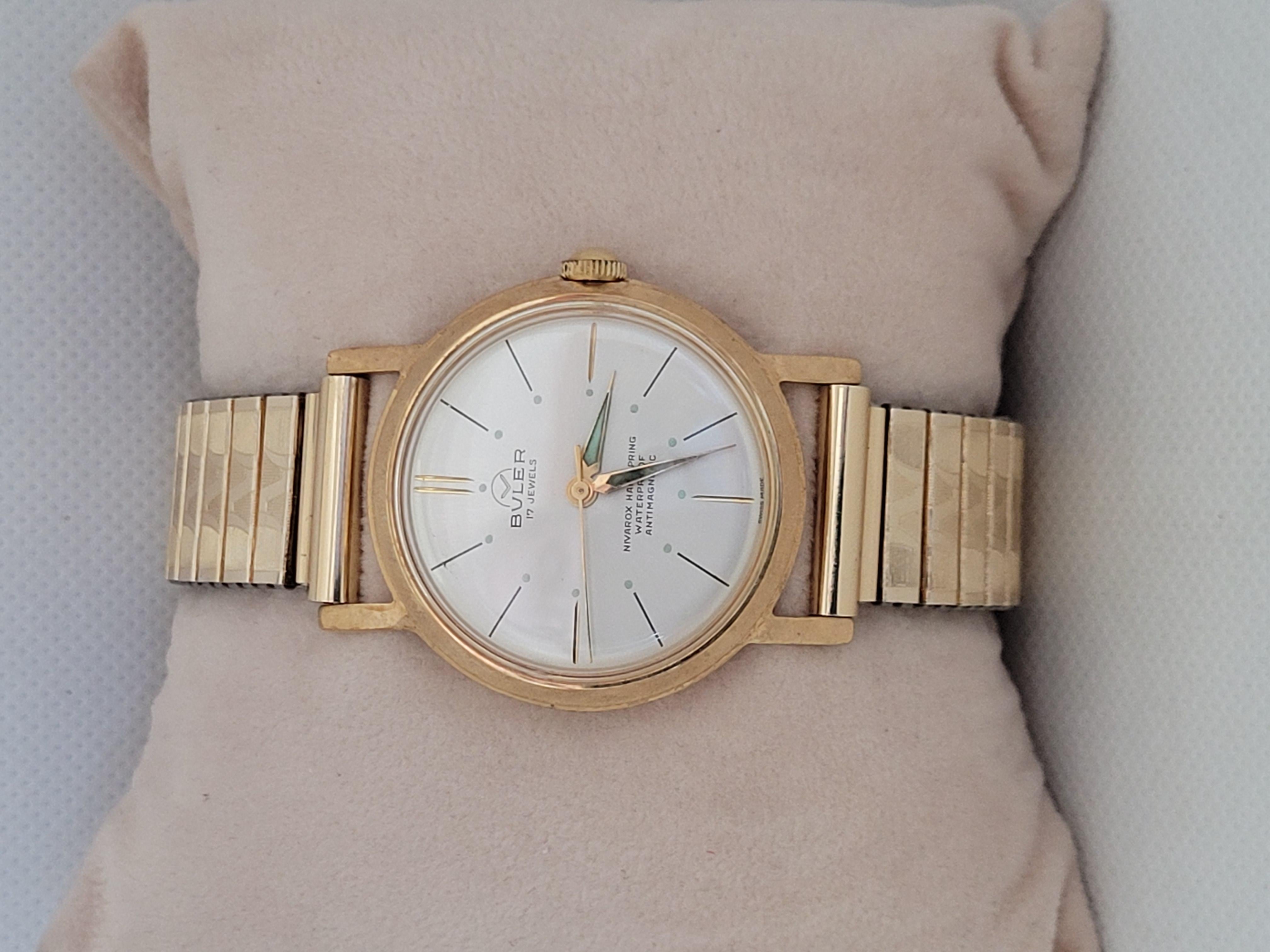 Vintage 1950s 34mm Buler mens watch in very good condition and working. The case is 9mm thick and marked on the back model #1197, antimagnetic, and Swiss-made. The movement is 17 jewels.  This watch is in beautiful condition and comes with original