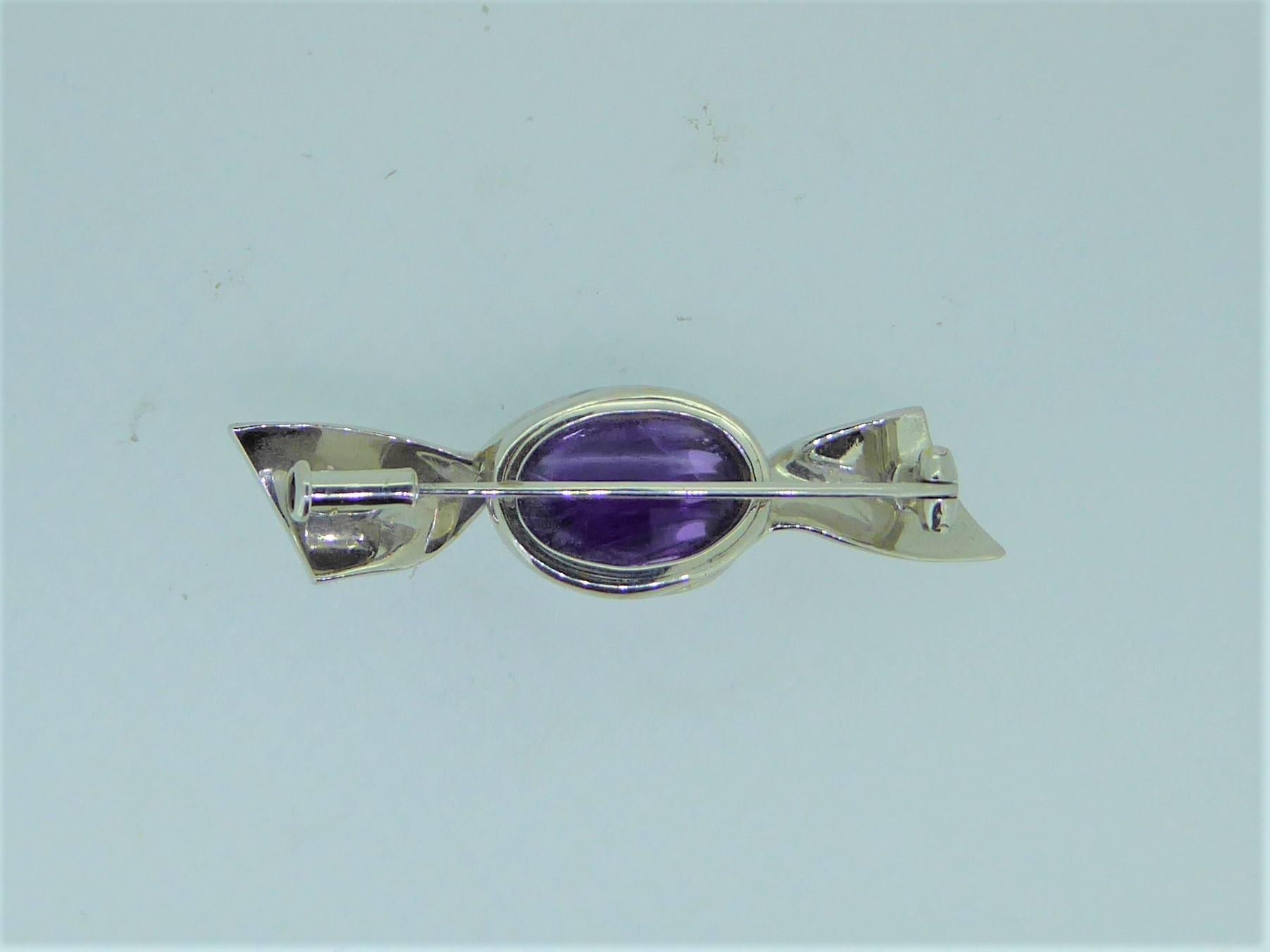 Oval Cut Bulgari 18 Carat White Gold and Amethyst Sweet Wrapper Brooch For Sale
