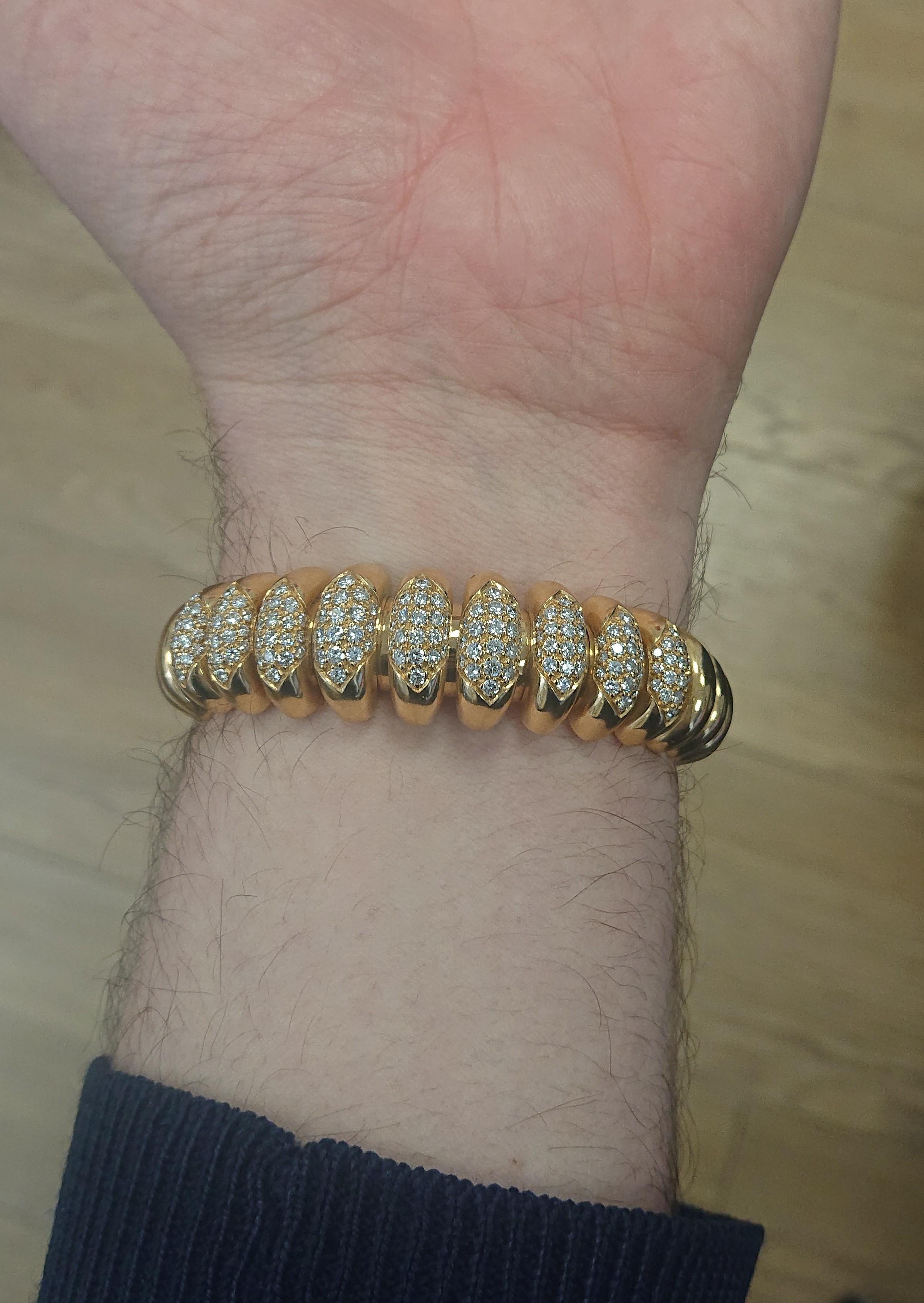 Bulgari 18 Carat Yellow Gold and Diamond Celtaura Bracelet Bangle In Good Condition In London, GB