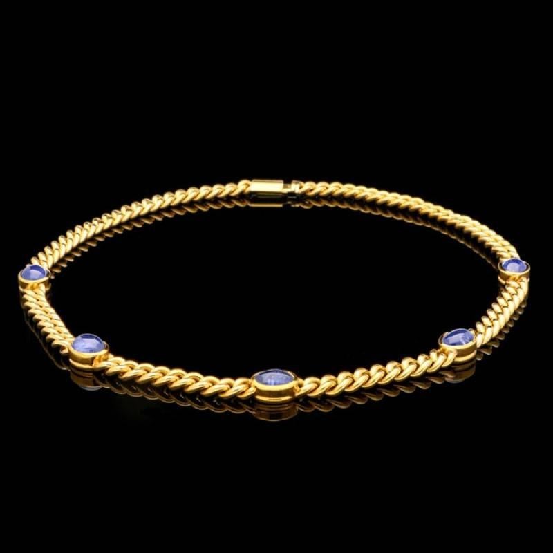 Oval Cut Bulgari 18 Carat Yellow Gold Curb Link Chain Set with Sapphire Oval Cabochons