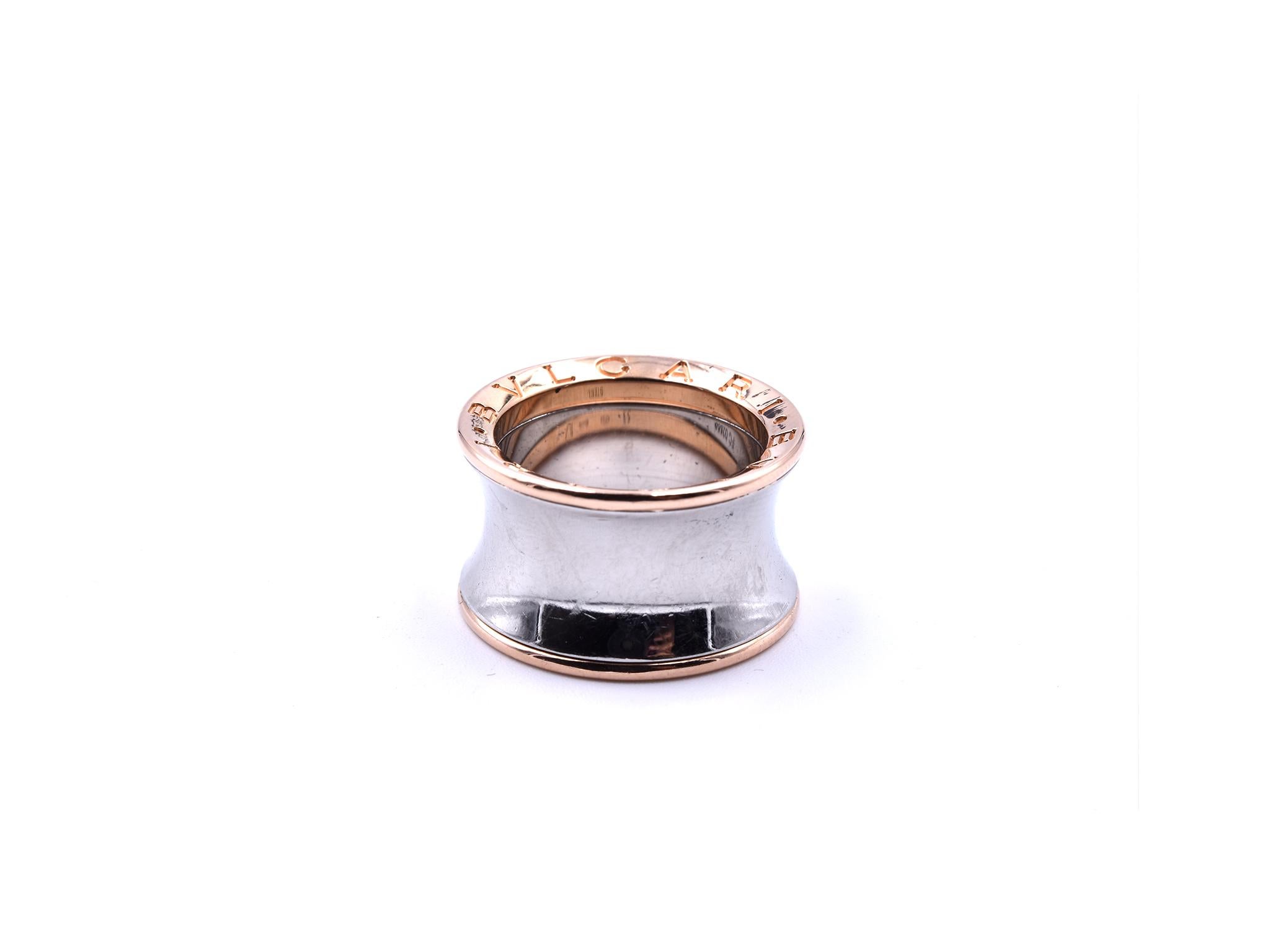 Designer: Bulgari
Material: 18k rose gold and stainless steel
Dimensions: width of ring is 12.54mm wide 
Weight: 10.02 grams
