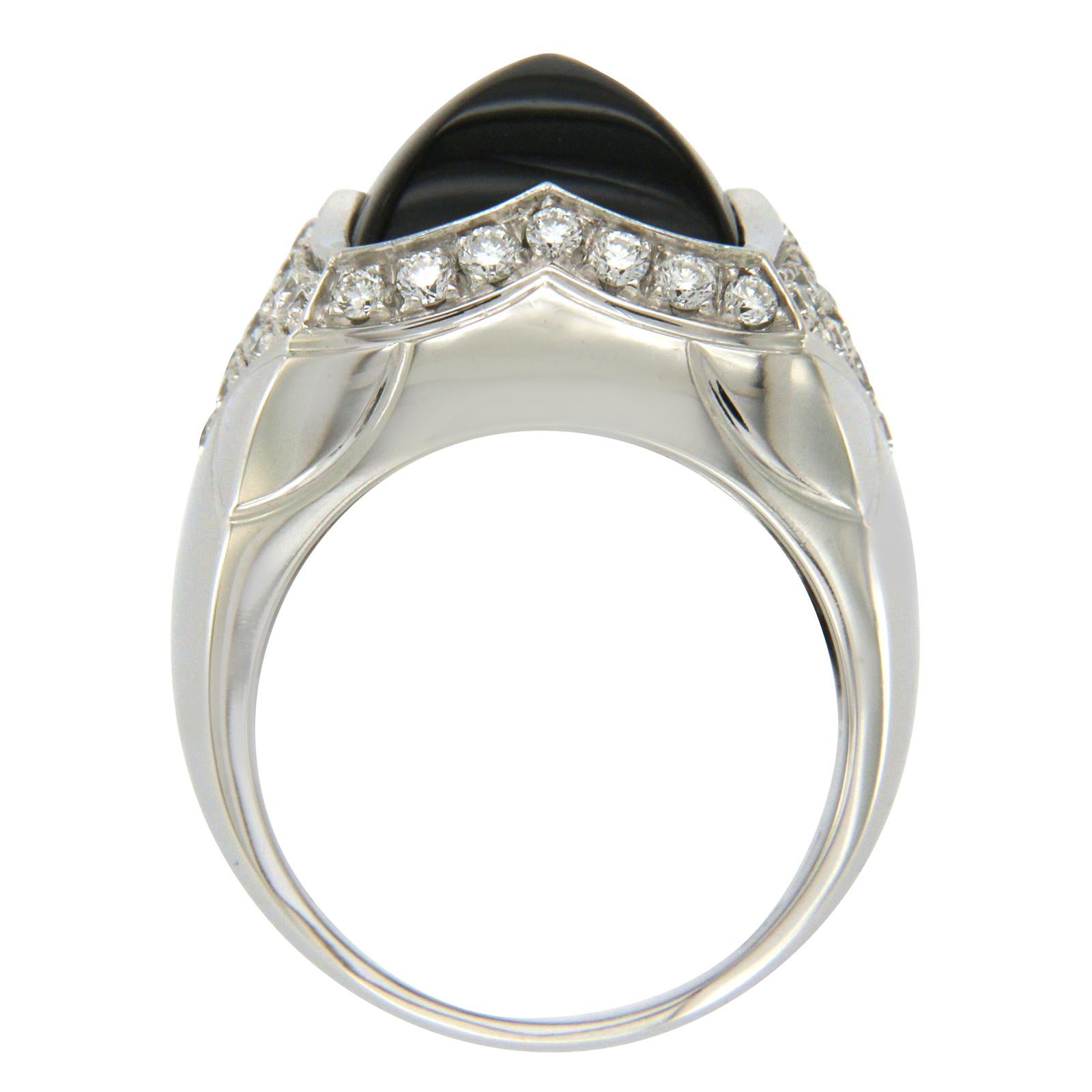 Type: Ring
Top: 18 mm
Band Width: 4.7 mm
Metal: White Gold
Metal Purity: 18K
Size: 7.5
Hallmarks: BVLGARI 750
Total Weight: 18.6 Grams
Stone Type: 1.35 VVSI F Diamonds and Onyx
Condition: Pre Owned
Stock Number: U118
Retail Price: $12000