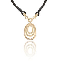 Pendentif Bulgari en or jaune 18 carats et diamants sur Corde