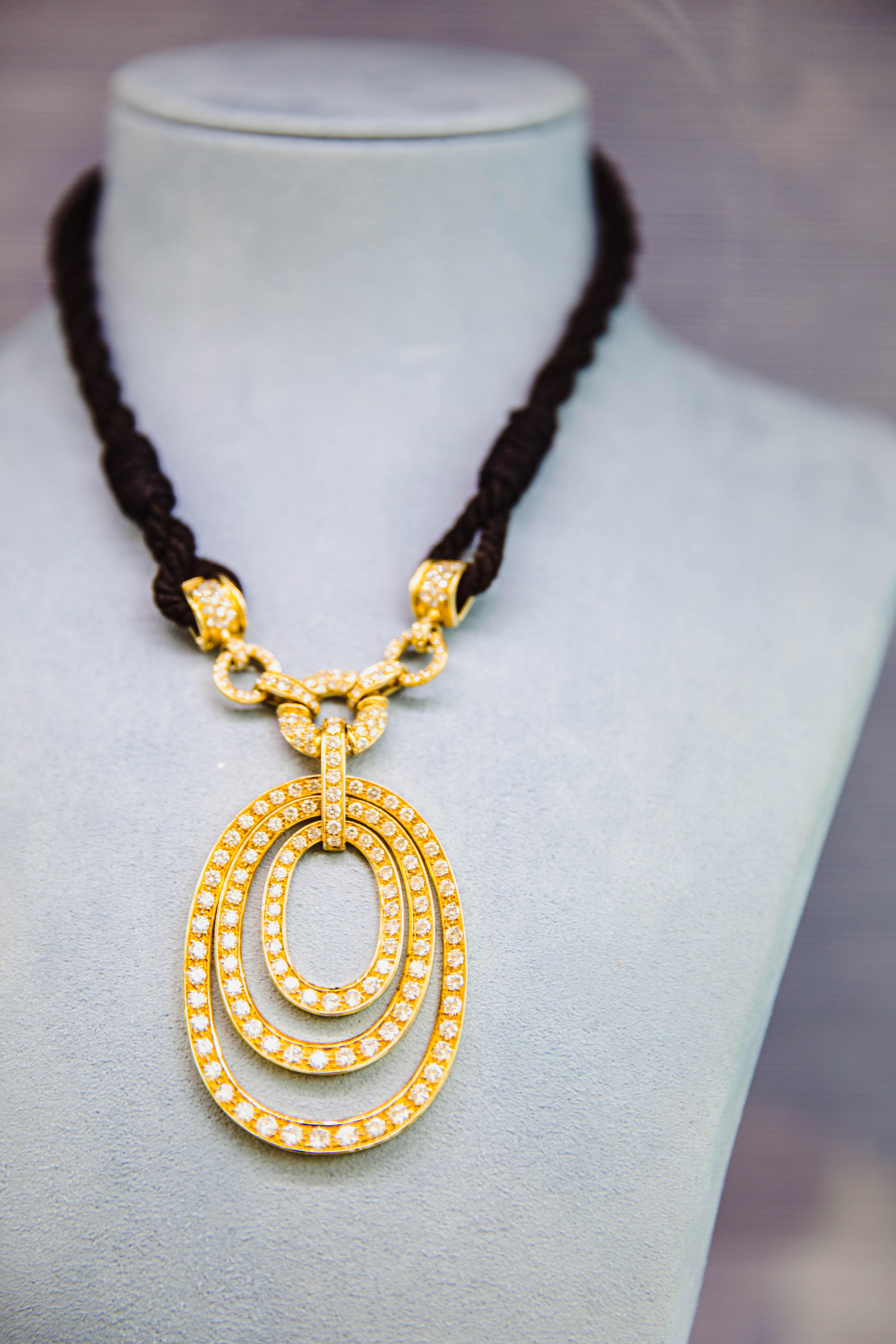 Women's Bulgari 18 Karat Yellow Gold and Diamond Pendant on Cord For Sale