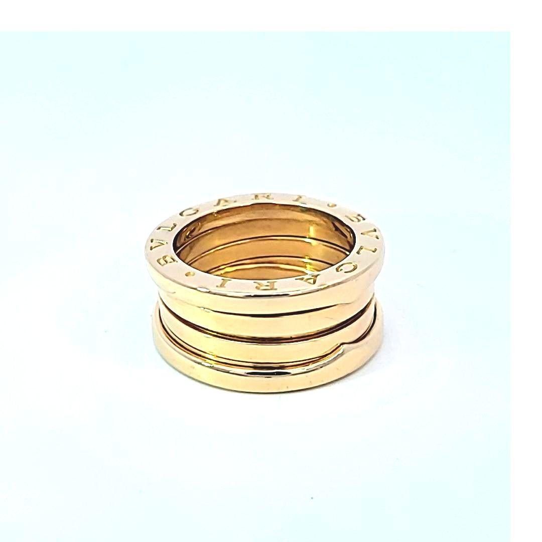 B.Zero1 band ring in 18 karat yellow gold by Bulgari.  This rings spiral design is meant to represent the past, present and future and was inspired by the Colosseum in Rome.  This is a true statement piece from the prestigious Bulgari brand.  