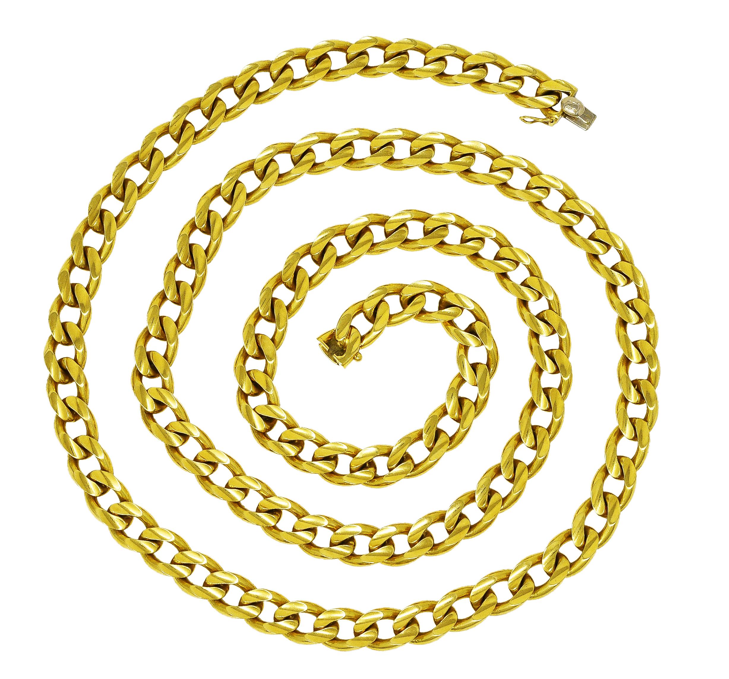 Necklace is designed as a stylized curb link chain. With concave impression on surface of links. Completed by hidden clasp closure with figure eight safety. Stamped 750 for 18 karat gold. Fully signed with maker's mark for Bvlgari. With assay marks