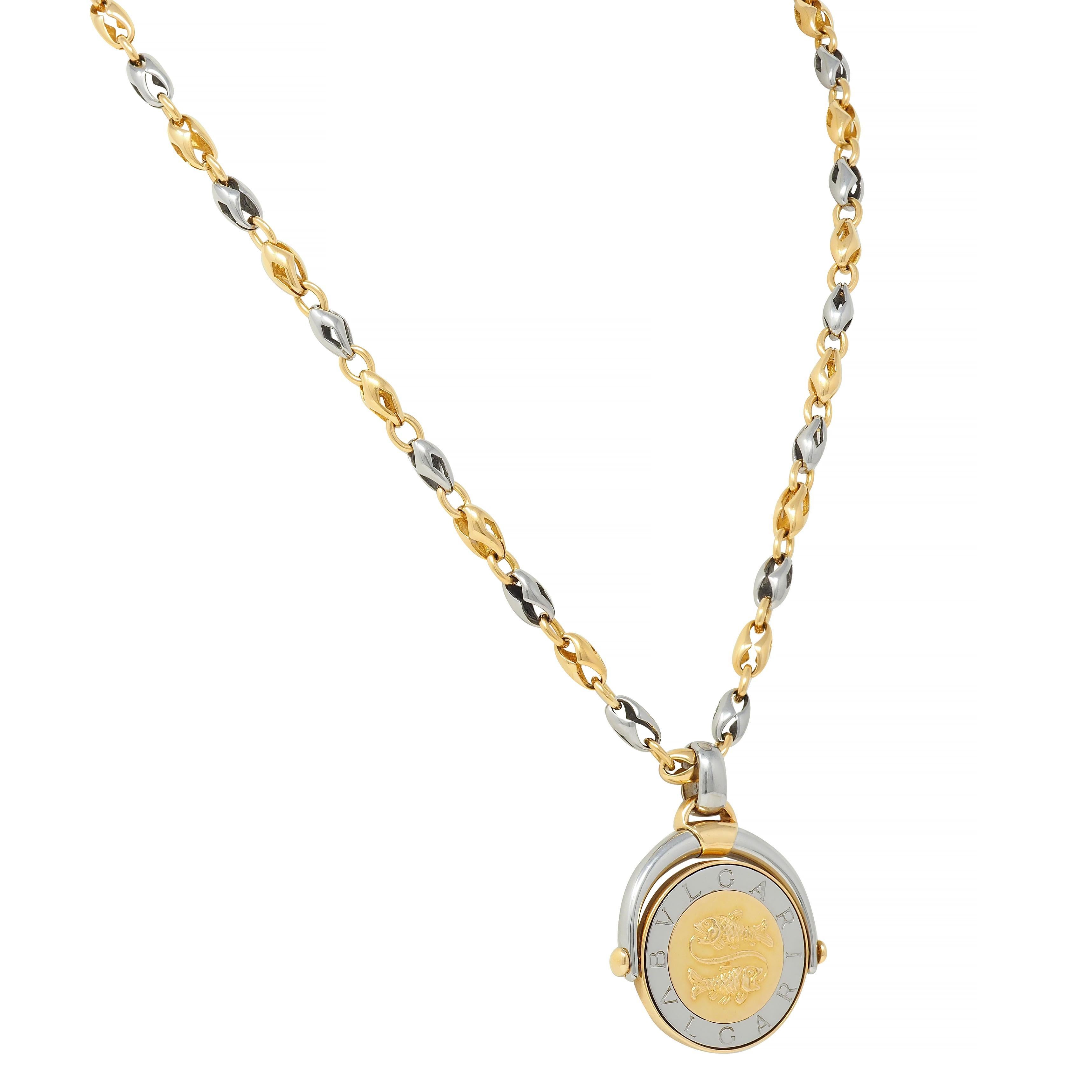 Women's or Men's Bulgari 18 Karat Yellow Gold Stainless Steel Pisces Zodiac Flip Pendant Necklace For Sale