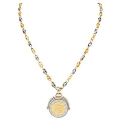 Bulgari 18 Karat Yellow Gold Stainless Steel Pisces Zodiac Flip Pendant Necklace