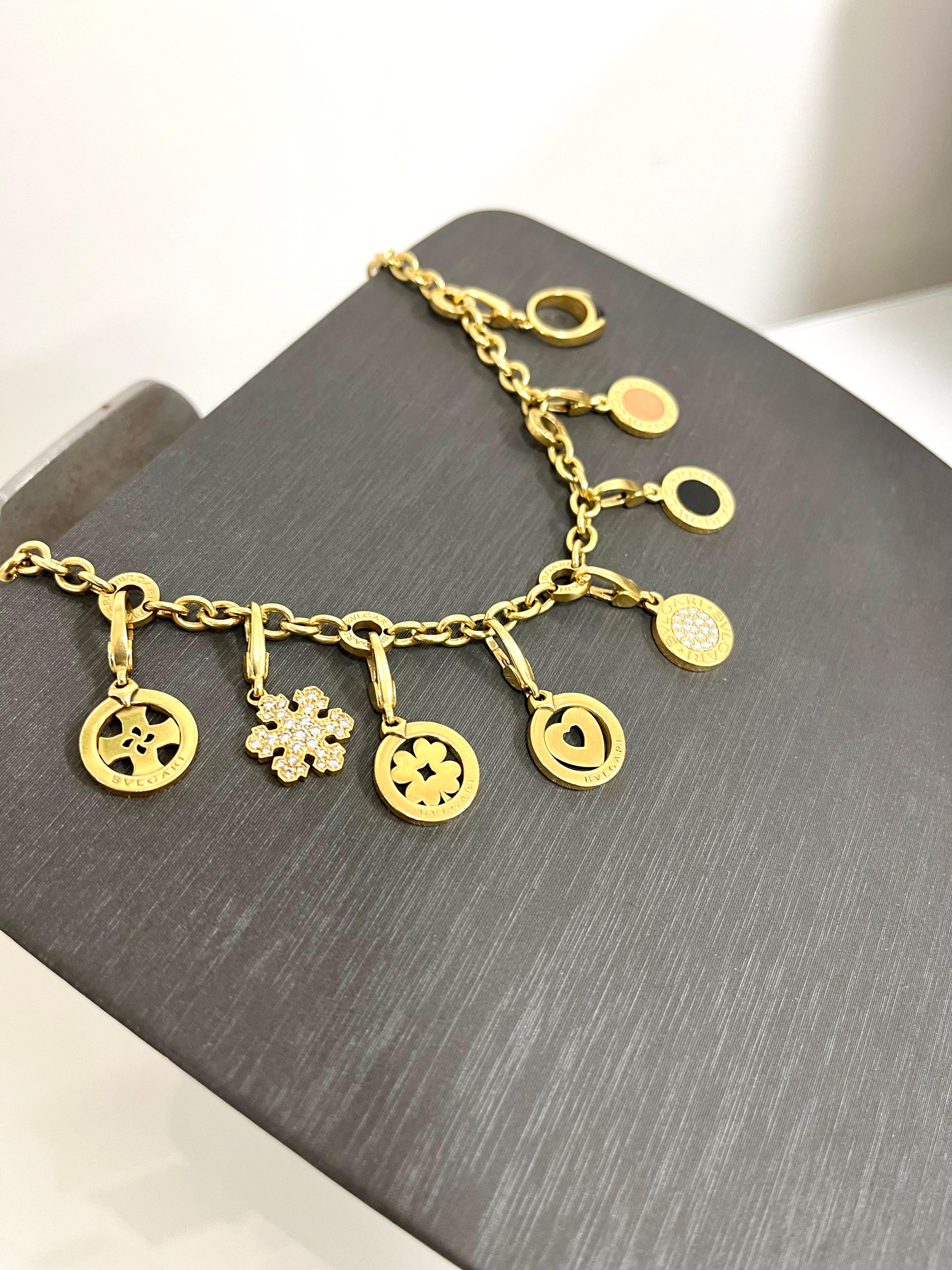 Bulgari 18 Kt. Yellow Gold Diamonds Semiprecious Stones Charms Bracelet In Excellent Condition In Rome, IT
