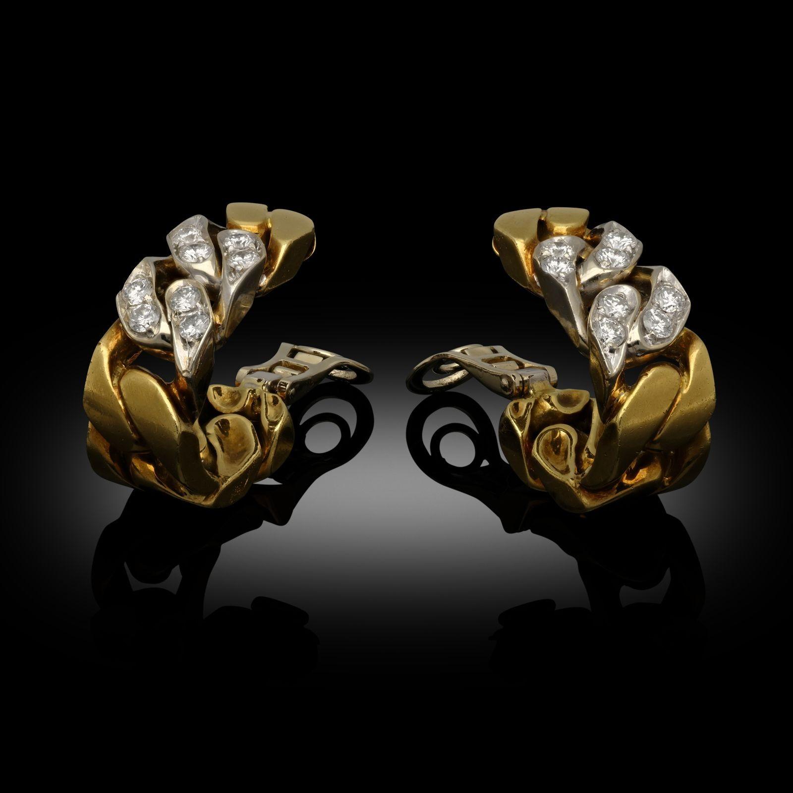Gold and diamond curb link ear clips by Bulgari c.1970s, of wide flattened curb link chain design in 18ct yellow and white gold, two front links set with round brilliant cut diamonds, to hinged clip fittings.
Maker
Bulgari
Period
Circa