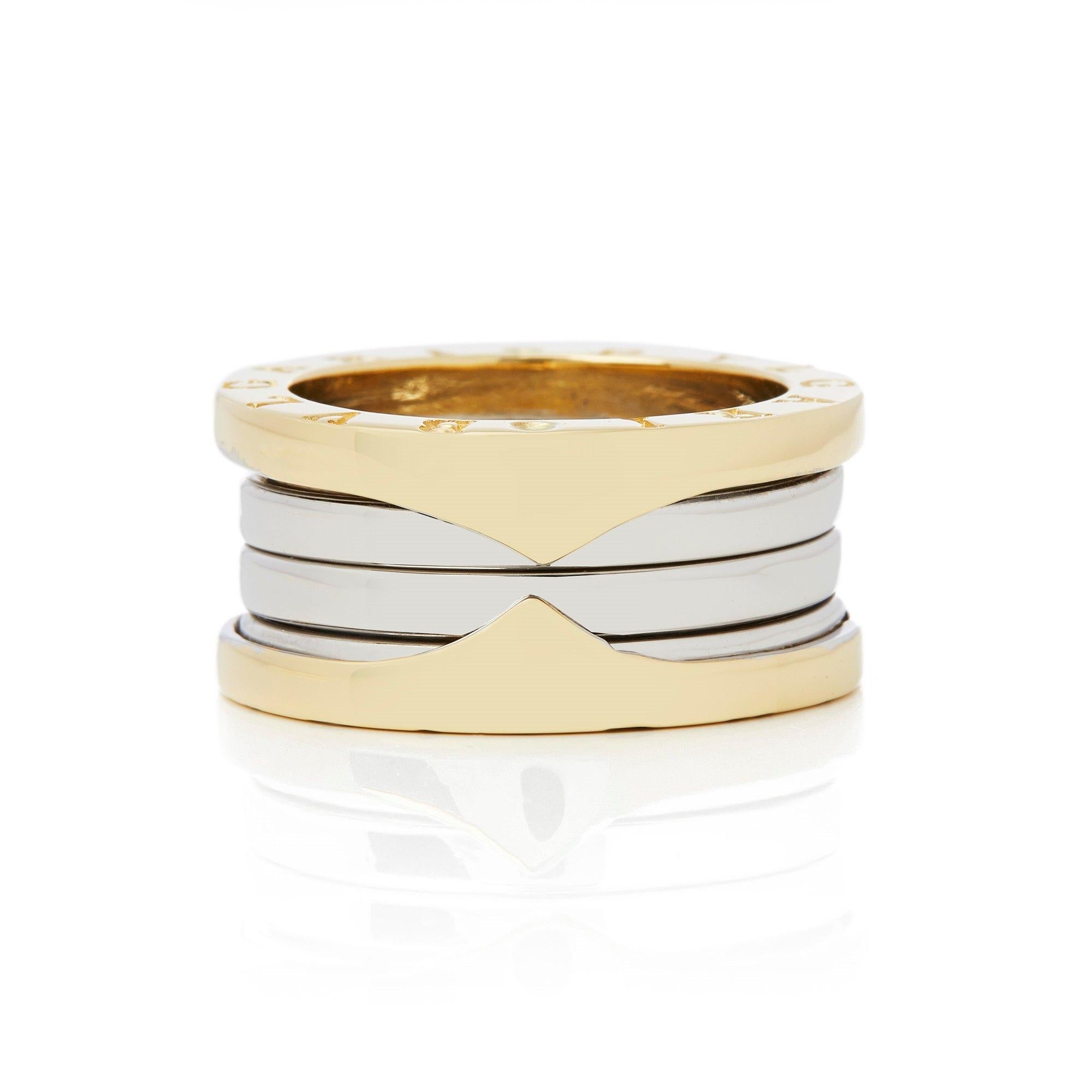 Dieser Ring von Bulgari ist aus ihrer B Zero 1 Kollektion und misst 10::68 mm Breite. Set in 18k Gelb- und Weißgold. Fingergröße UK O 1/2:: EU Größe 56 1/2:: USA Größe 7 1/2. Komplett mit Xupes Präsentationsbox. Unsere Xupes-Referenz ist COMJ235::