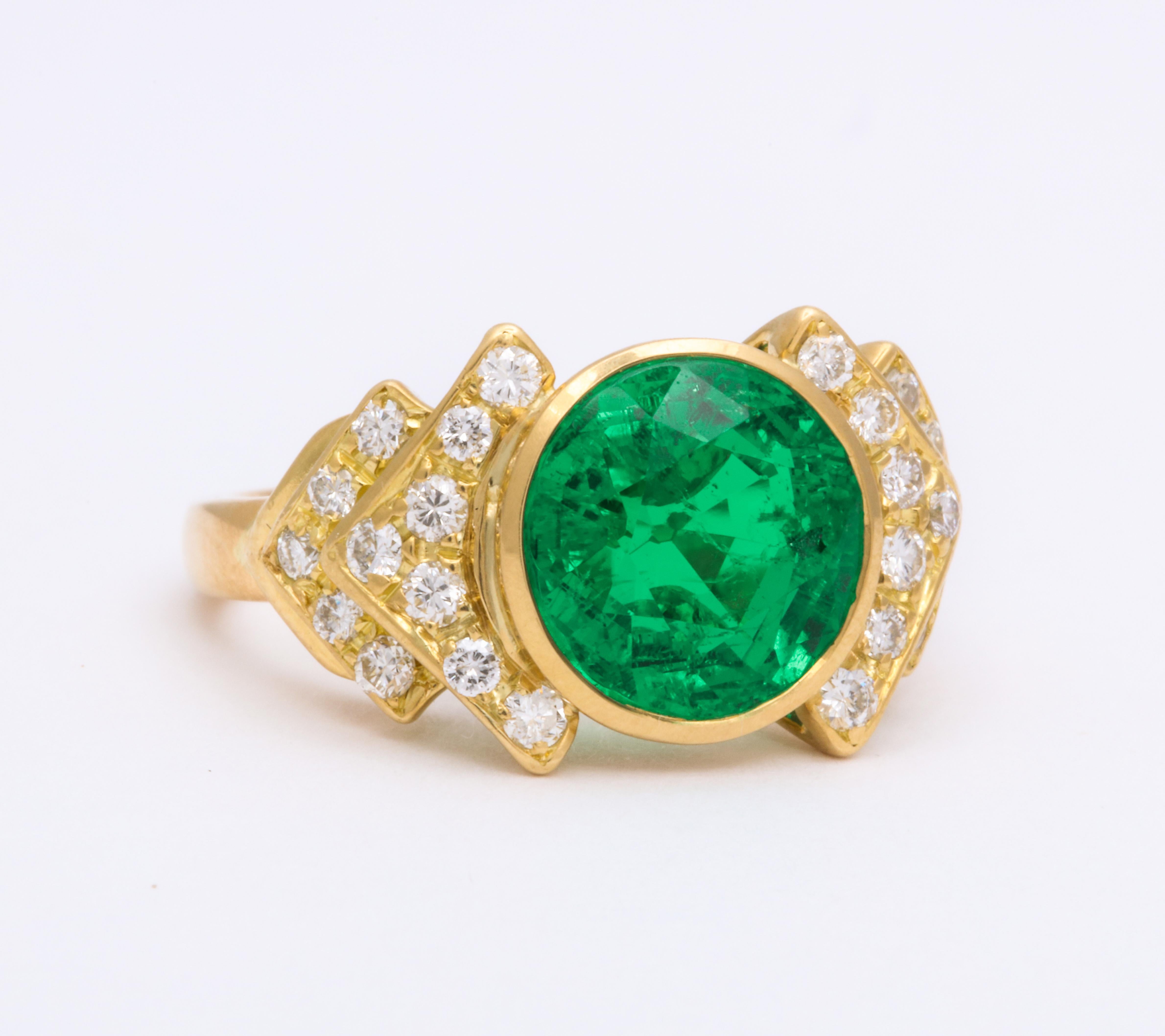This Bulgari stunner will have your friends talking! An rare find; round faceted Columbian emerald weighing 3.65cts has accompanying AGL gem report stating said emerald is from Colombia, and has only minor indications of oil enhancement. This green