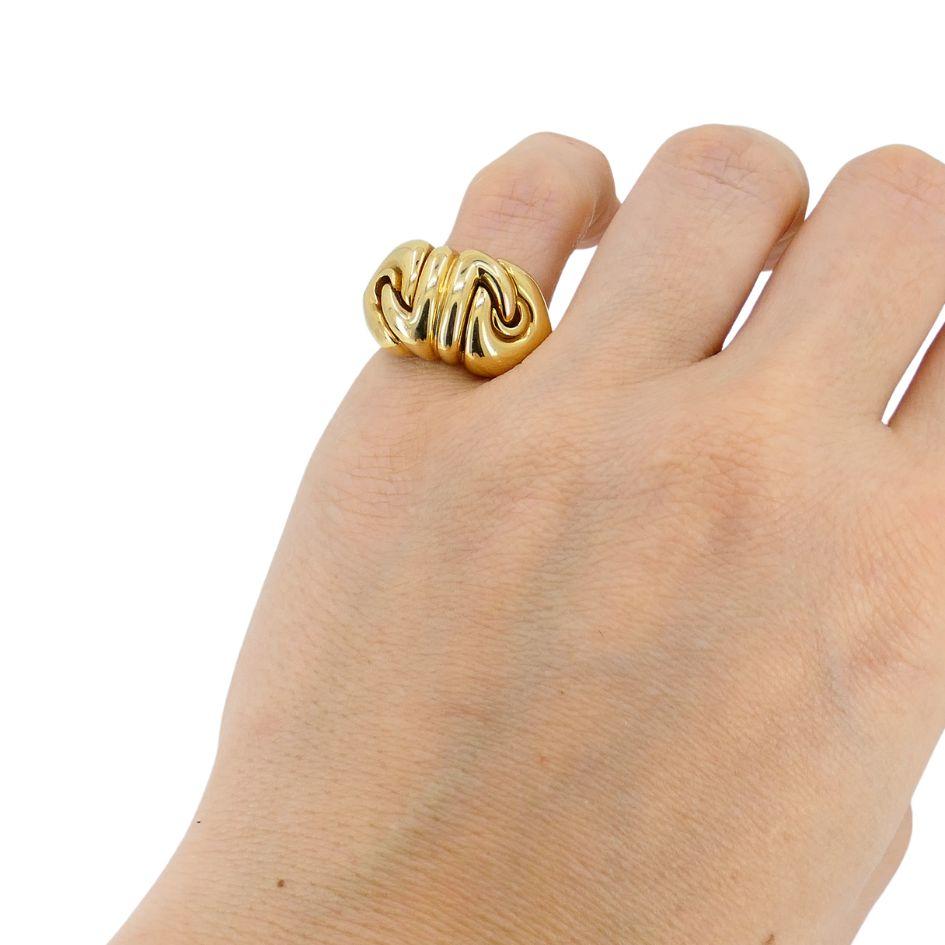 This Bvlgari Doppio Cuore ring from the early 2000s is a distinctive design that reflects the brand’s bold aesthetic. Crafted in high-polish 18k gold, the ring features an intertwined, sculptural motif that creates a fluid, symmetrical look.