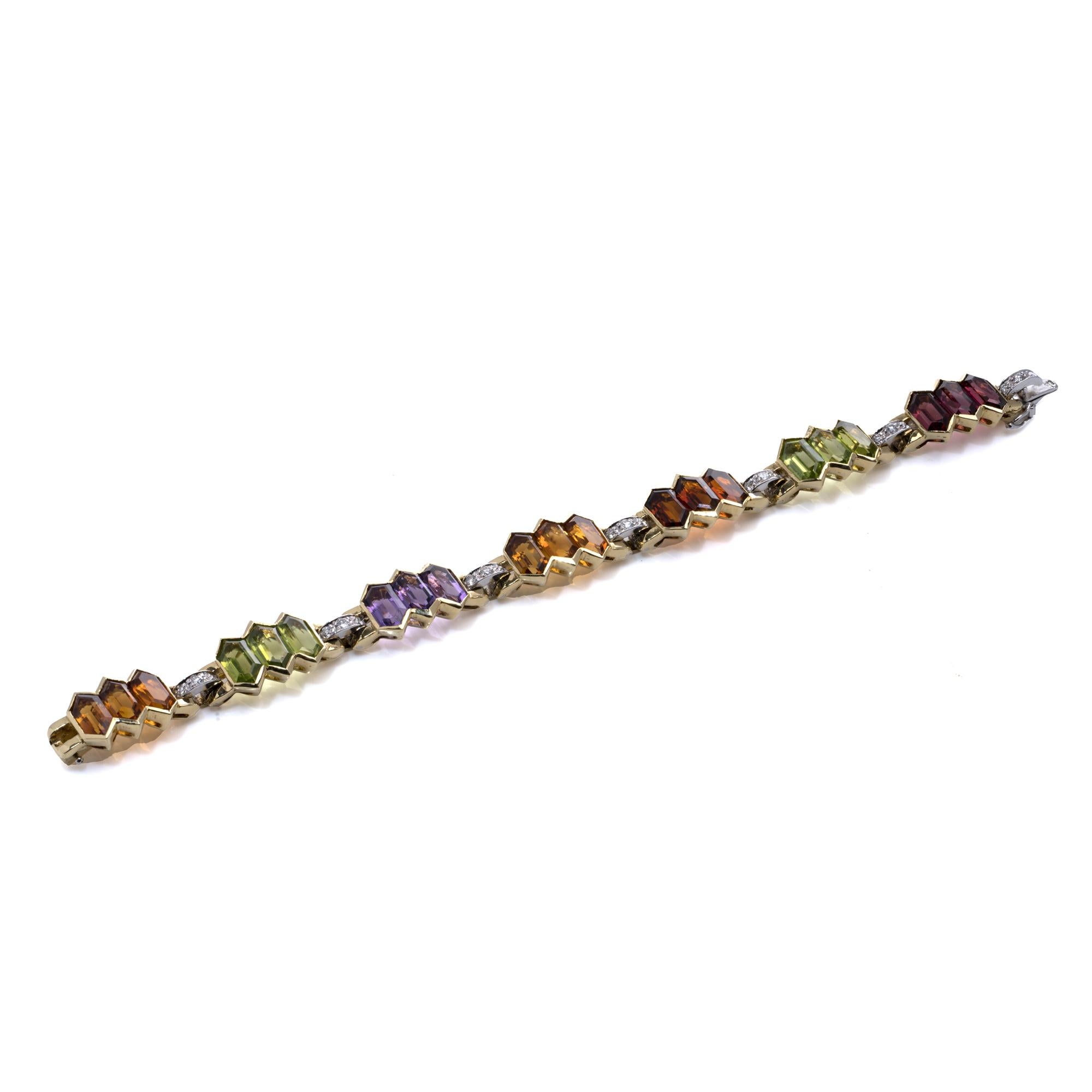 Bulgari 18K Gold Ladies’ Bracelet with Multicoloured Gemstones and Diamonds
Circa 2000.

This luxurious Bulgari bracelet is crafted in 18K gold and features a vibrant array of gemstones, showcasing Bulgari’s signature style of combining bold designs