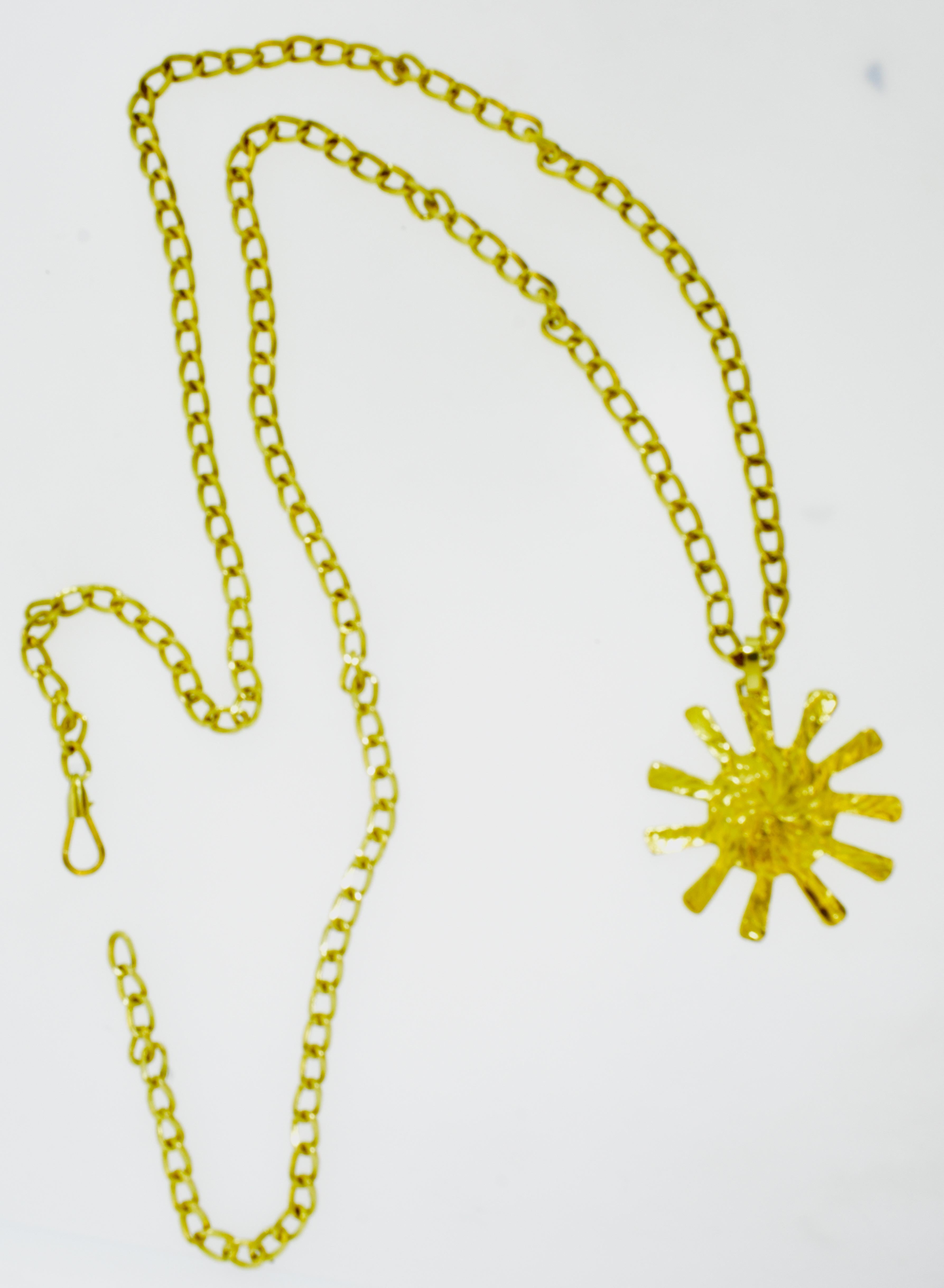 Contemporary Bulgari 18K Gold Long Chain with Bvlgari Iconic Sun Pendant, Italy, c. 1990