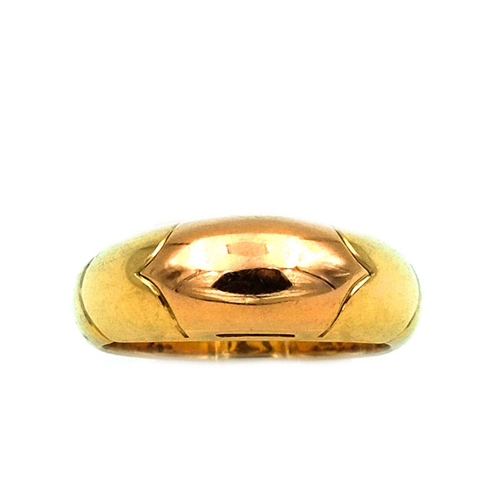 BULGARI 18K Two-Tone Gold Band Ring 

Sporty, elegant estate band ring with a domed ring head handcrafted of 18 K two-tone yellow and rose gold. 
A classy ring in a timeless design from the exclusive maison BVLGARI. This ring comes from a collection