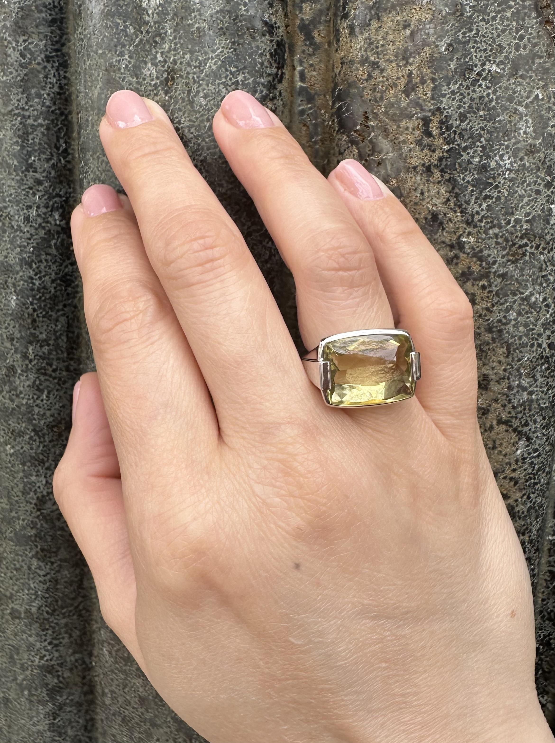 -- Stone(s) --
(1) Natural Genuine Lemon Quartz - Rectangular Buff Top Cut - Prong Set -Lemon Green Color - 15.9x12.6mm (approx.)

Material: Solid 18k White Gold
Material Weight: 12.34 Grams
Ring Size: 6.5 (fitted on finger, we can custom size this
