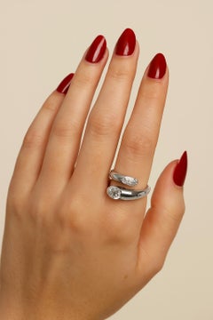 Bulgari 18K White Gold Oval and Round Diamond Bypass Ring