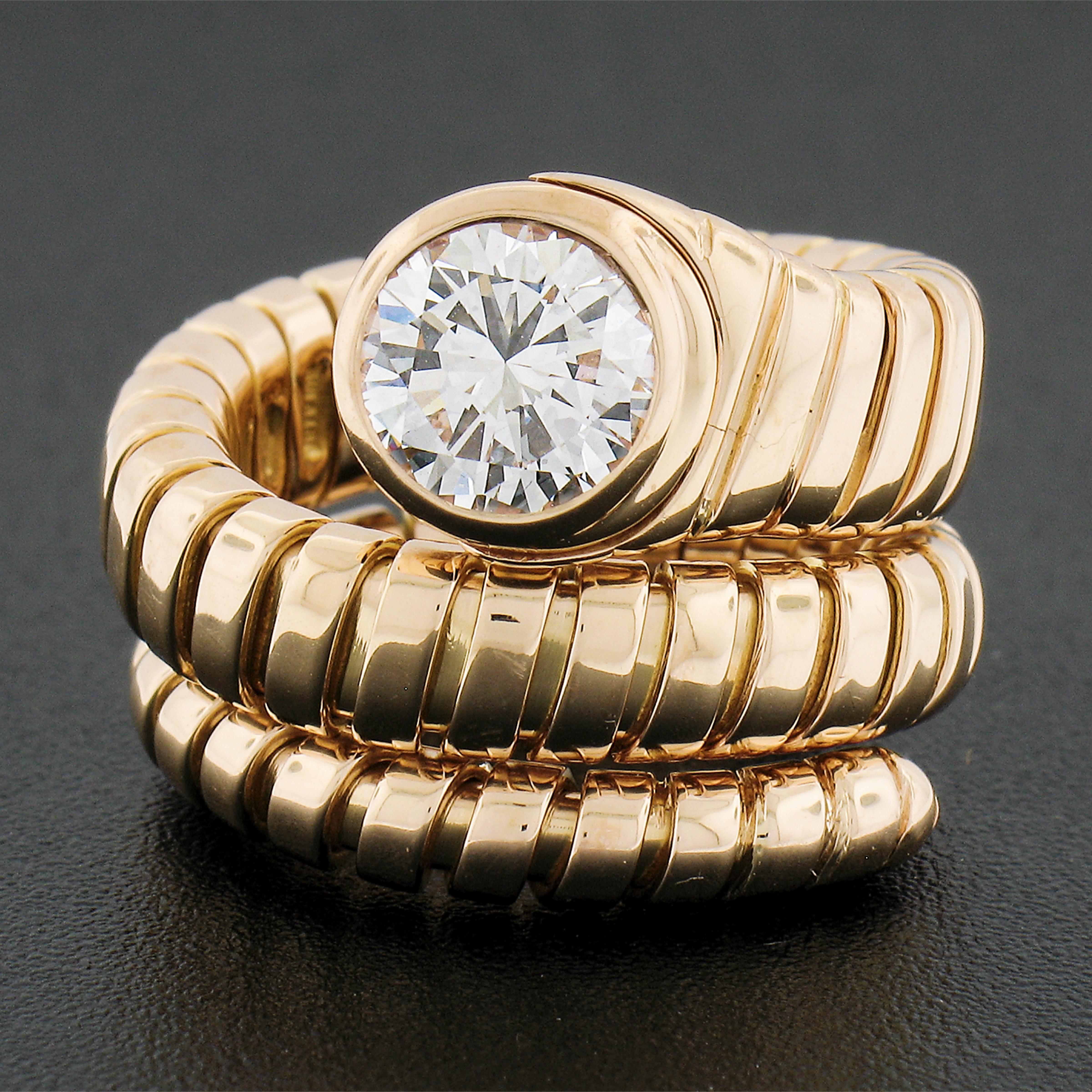 Round Cut Bulgari 18k Yellow Gold 1.3ct Solitaire Diamond Tubogas Snake Wrap Ring Size 5.5 For Sale
