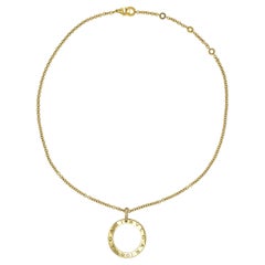 Bvlgari 18k Yellow Gold And Diamond Circle Pendant.