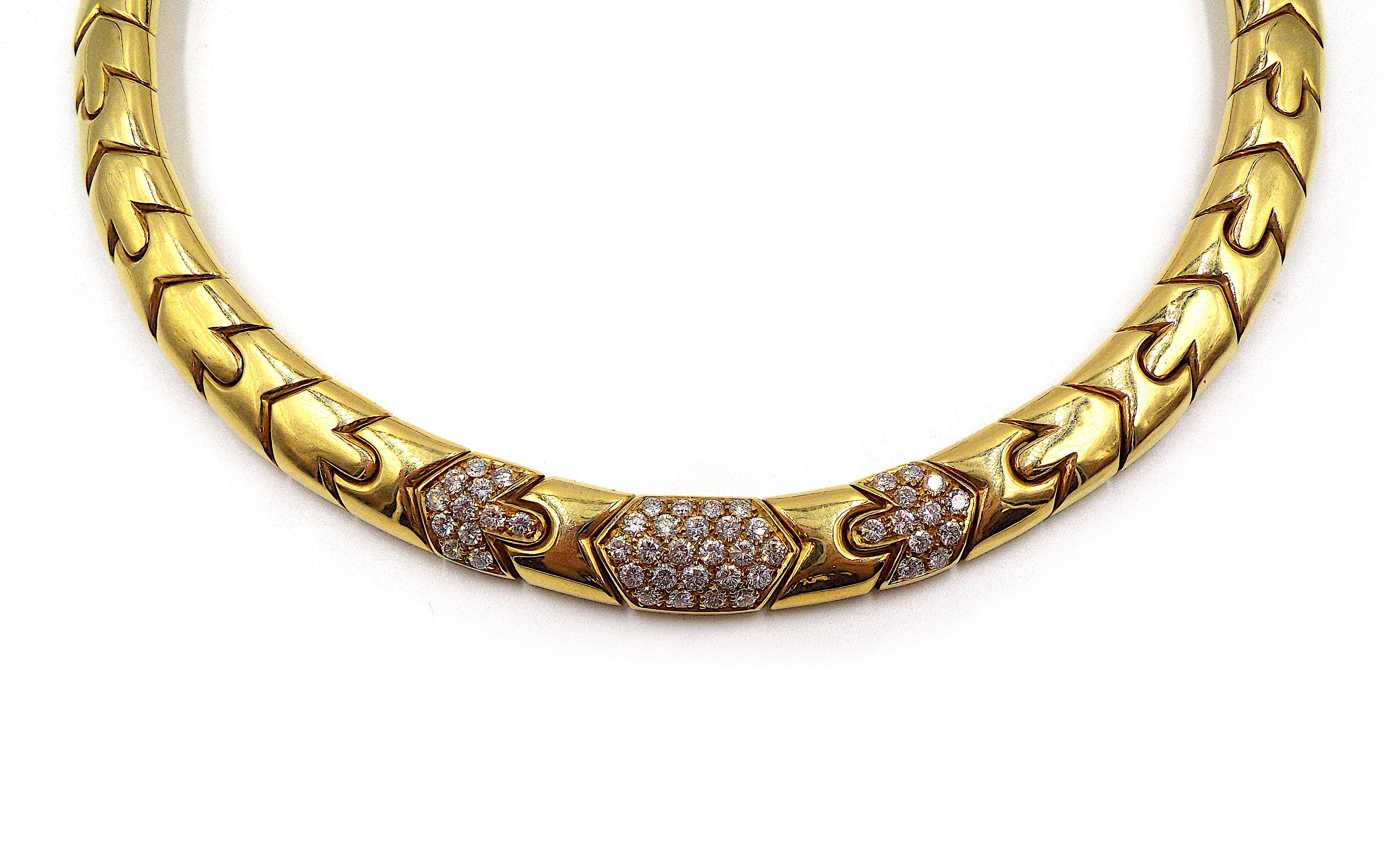 18 kt., composed of articulated geometric links centering diamond-set panels of 48 round diamonds ap. 2.25 cts., signed Bvlgari, ap. 82.7 dwts. Length 15 1/2 inches. Width 7/16 inch.