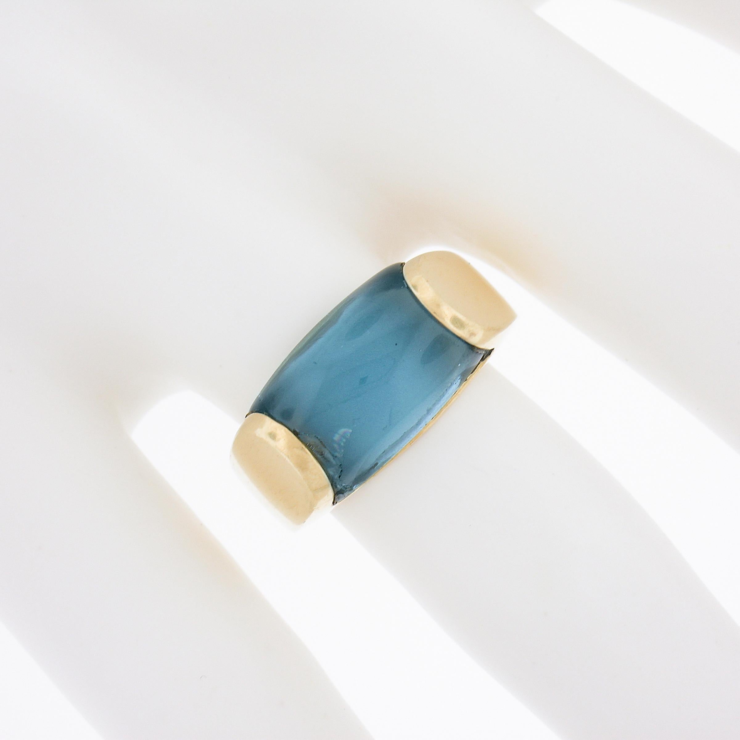 Bulgari 18K Yellow Gold Rectangular Blue Topaz Solitaire 9.2mm Wide Band Ring In Good Condition For Sale In Montclair, NJ