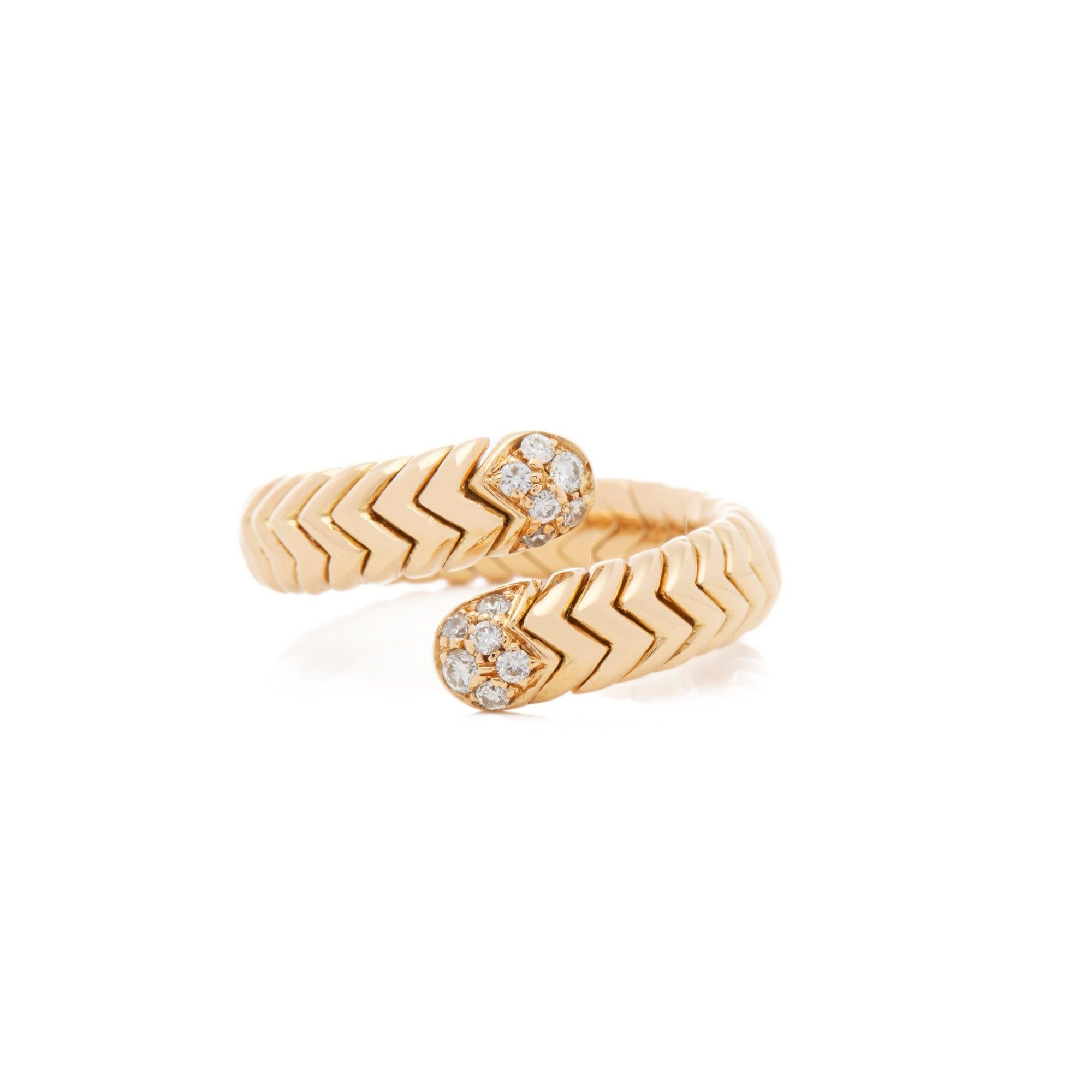 This Ring by Bulgari is from their Serpenti collection and features Twelve Round Brilliant Cut Diamonds Totalling 0.30cts mounted in an 18k Yellow Gold band. UK Finger Size P, EU SIze 57, USA Size 8. Complete with Xupes Presentation Box. Our Xupes