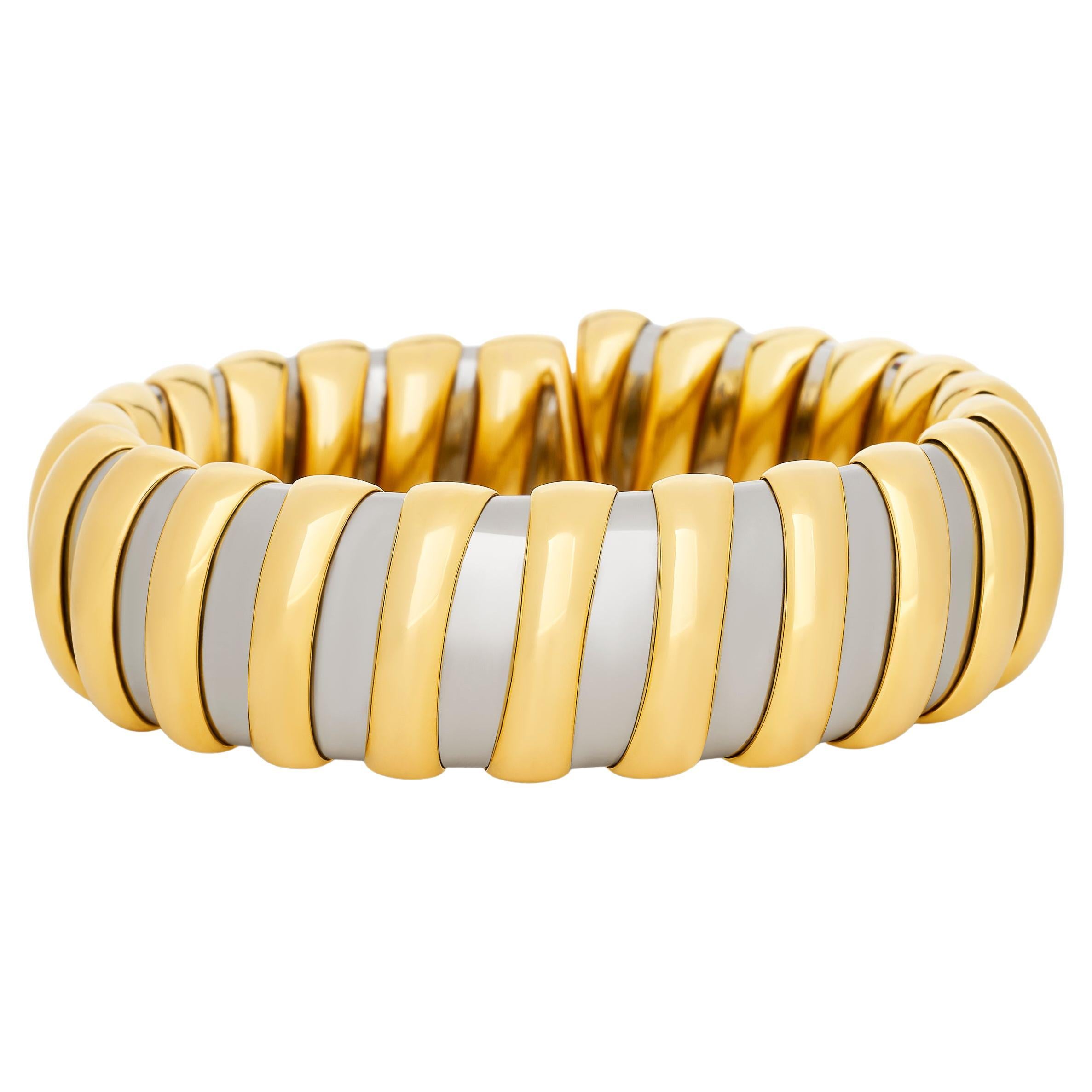 Bracciale a coste Tubogas di Bulgari in acciaio e giallo 18 carati