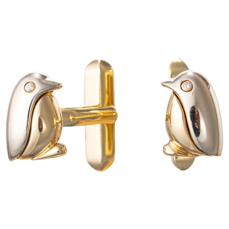 Gemelli Bulgari con diamante e pinguino in oro giallo bianco 18
