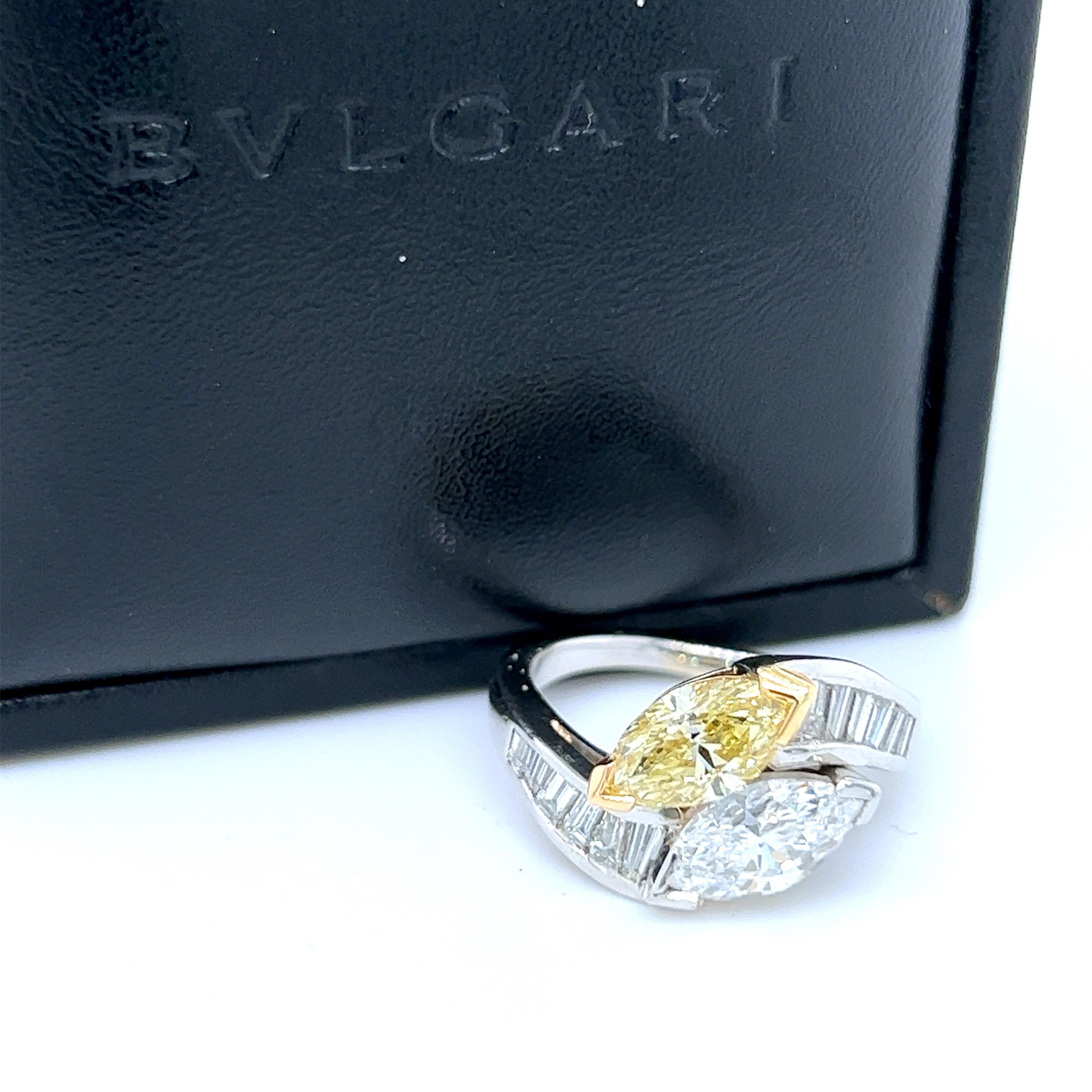 Original 1980 BULGARI Toi et Moi Ring featuring two top quality GIA Certified Extraordinary Marquise Cut Diamond in a Diamond Baguette Cut Platinum setting, adding an extra touch of allure to this extraordinary piece.
As stated in rare two GIA New