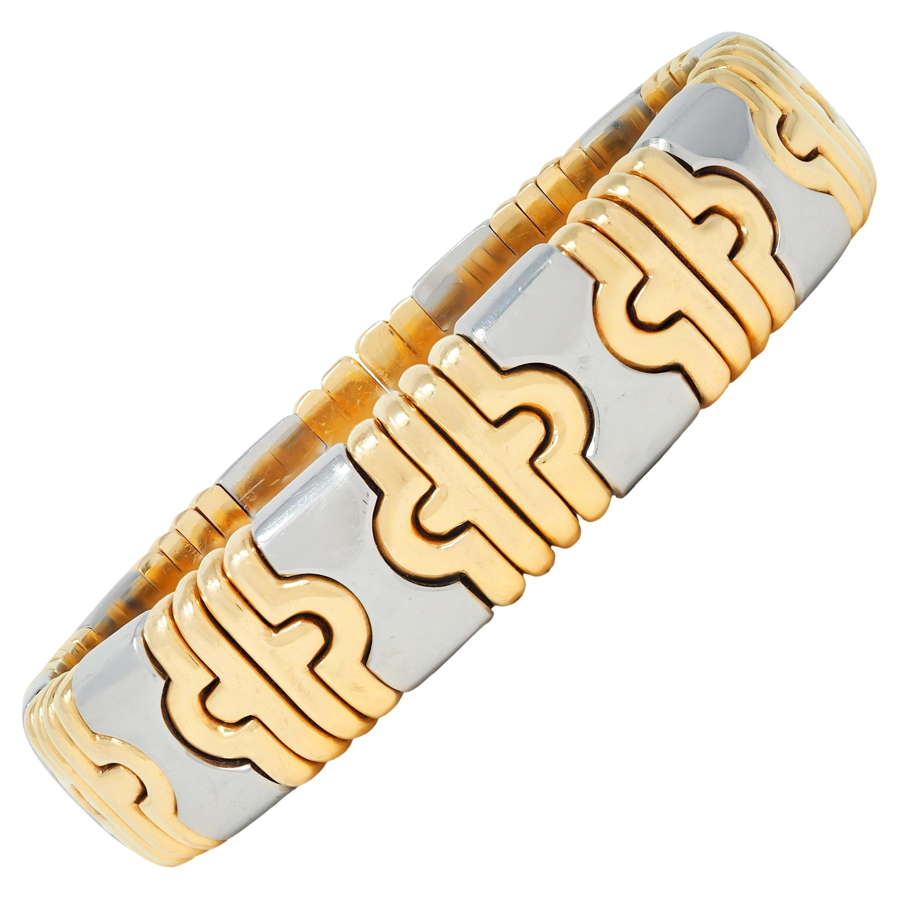 Bracelet manchette Bulgari 1980 en or jaune 18 carats et acier Parentesi