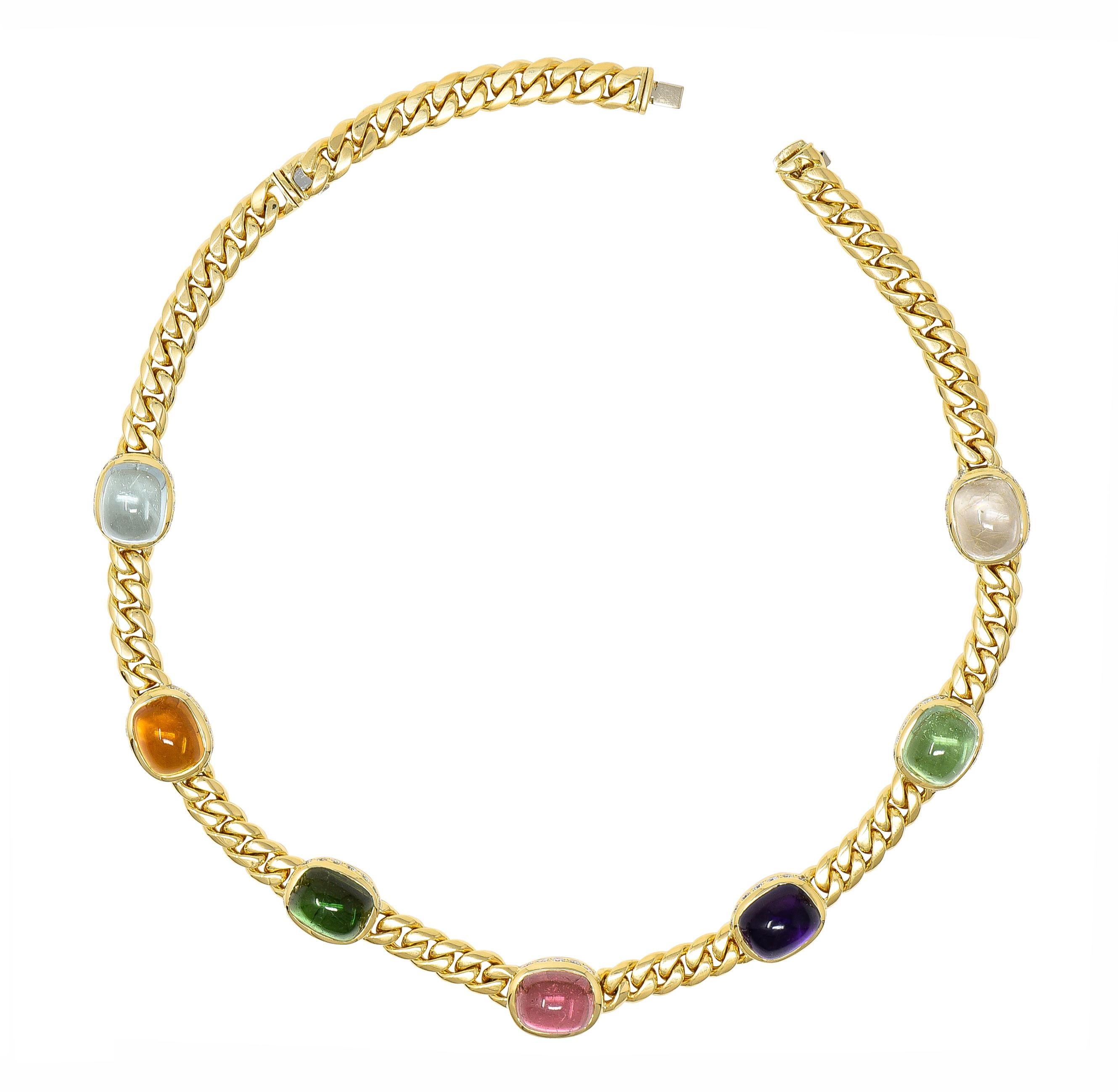Designed as curb link chain featuring seven stations featuring cushion shaped cabochons measuring 11.0 x 13.0 mm. Consisting of amethyst, citrine, aquamarine, pink tourmaline, green tourmaline, and rutilated quartz. Transparent medium purple,