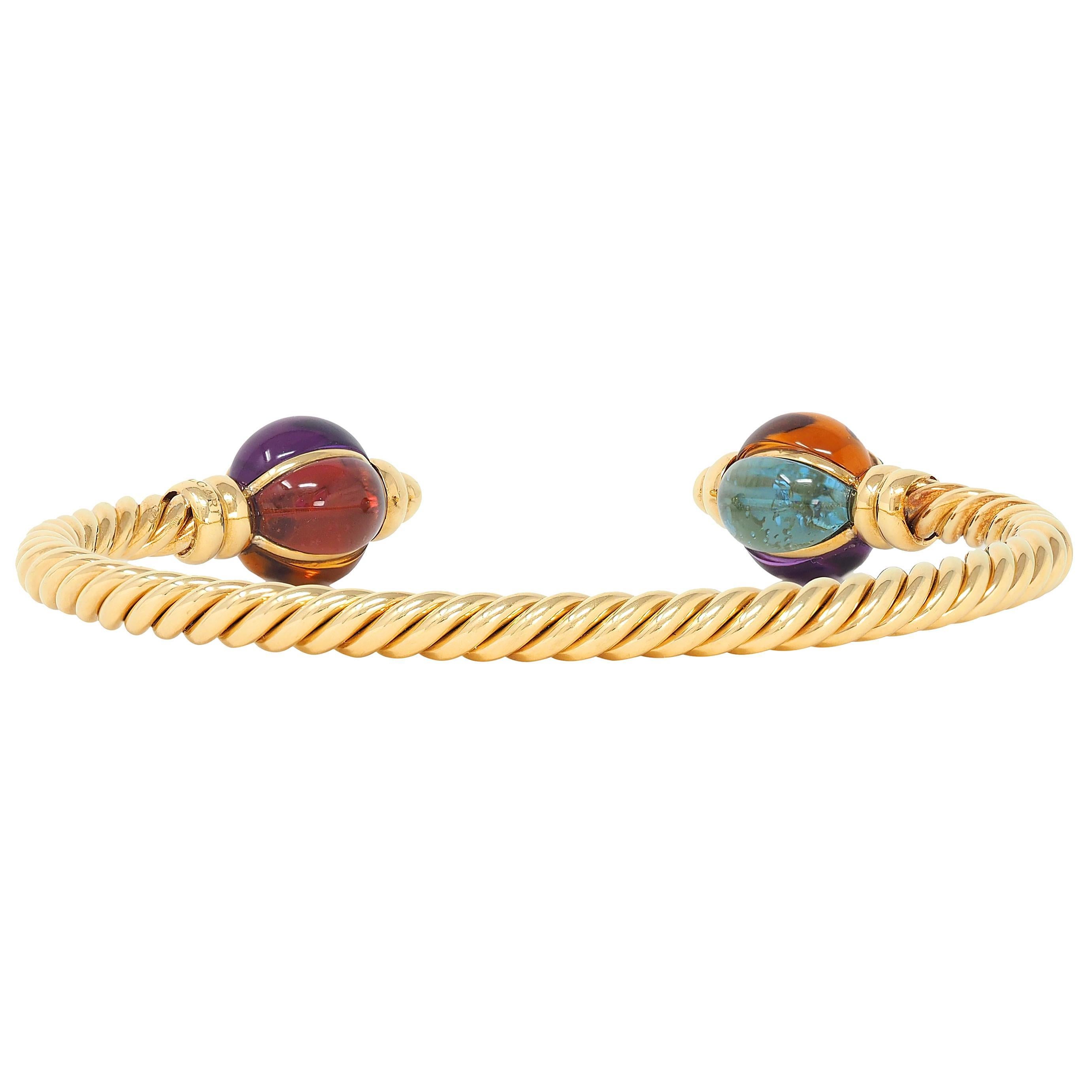 Taille cabochon Bracelet manchette en or jaune 18 carats Bulgari des années 1980 avec plusieurs pierres précieuses et cordes torsadées en vente