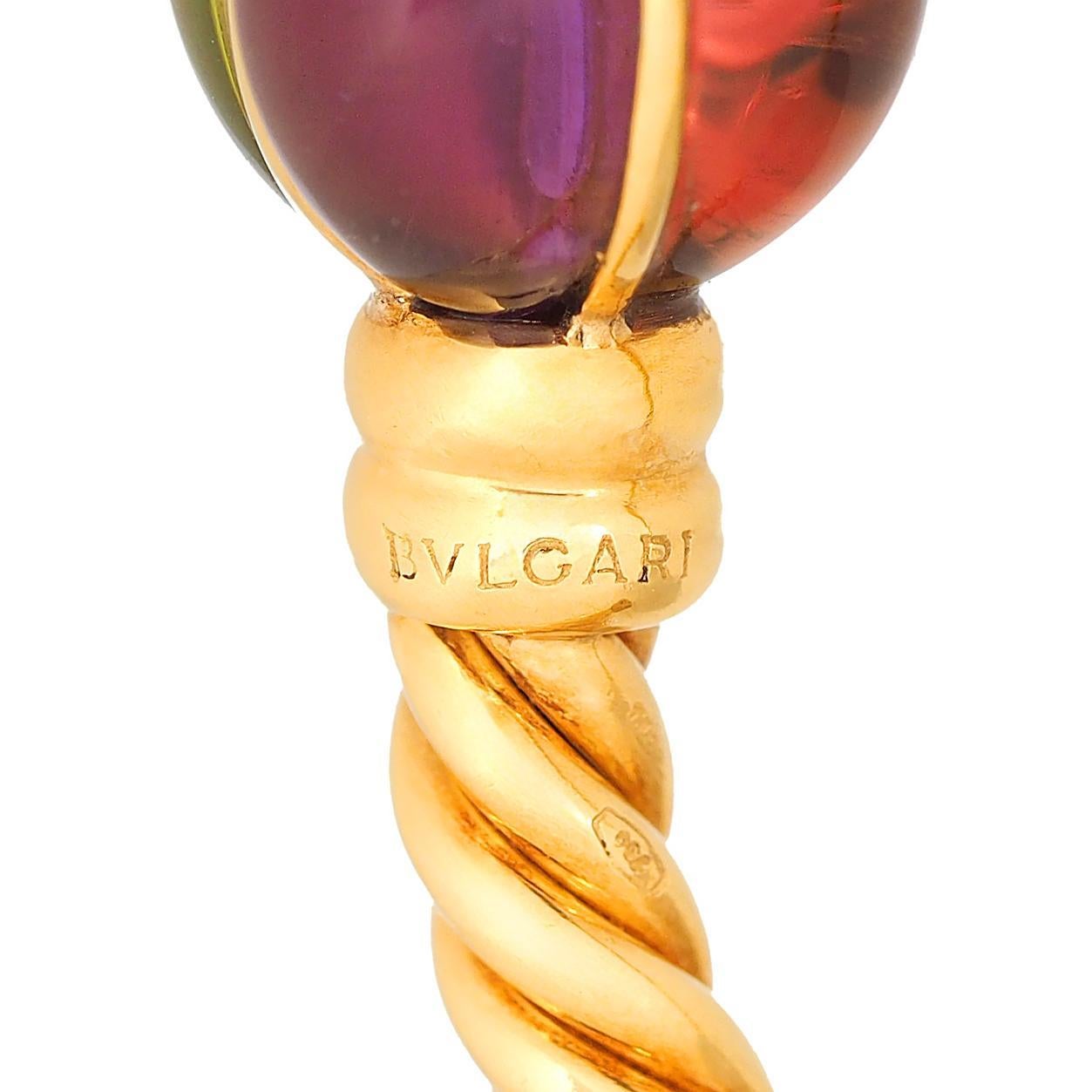 Bracelet manchette en or jaune 18 carats Bulgari des années 1980 avec plusieurs pierres précieuses et cordes torsadées en vente 1