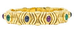 Bulgari 1980's Ruby Sapphire Emerald 18 Karat Gold Tubogas Parentesi Bracelet