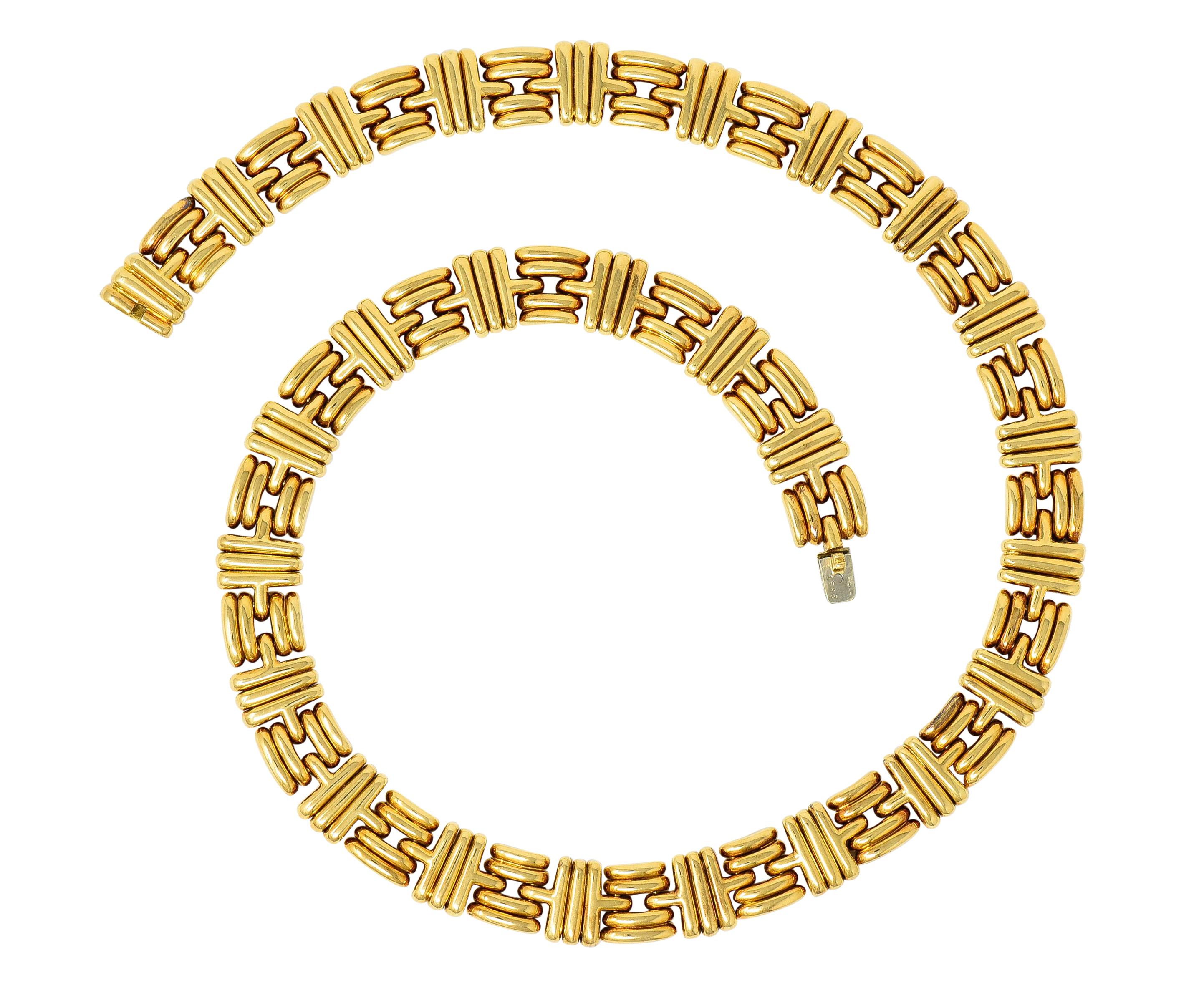 Collar style necklace comprised of stylized ribbed links featuring two designs

One link being four horizontal segments alternating with second link of three vertical segments

Completed by a polished finish and a concealed clasp with a fold-over